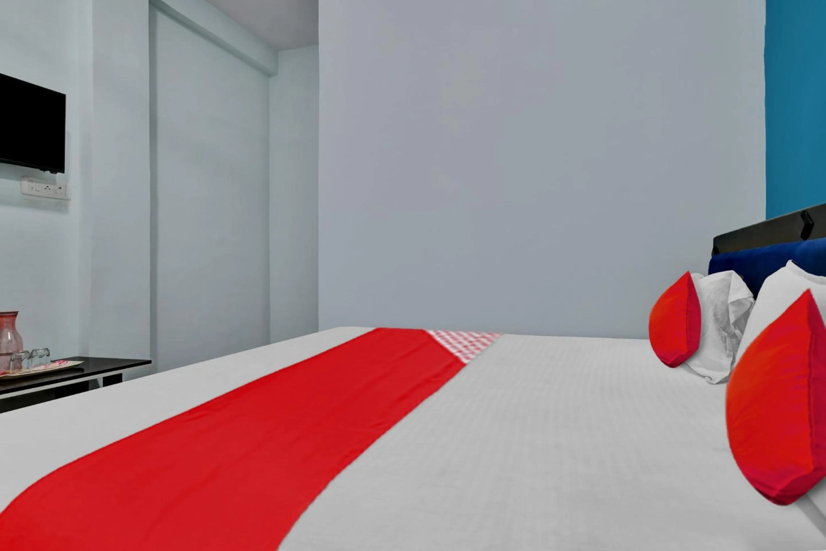 Bedroom in Hotel O Choice Inn