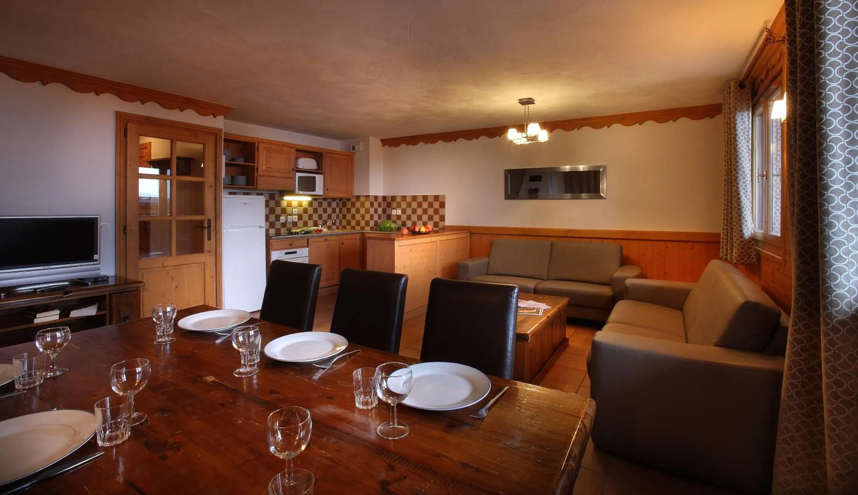 Kitchen or kitchenette in Chalet des Neiges Plein Sud