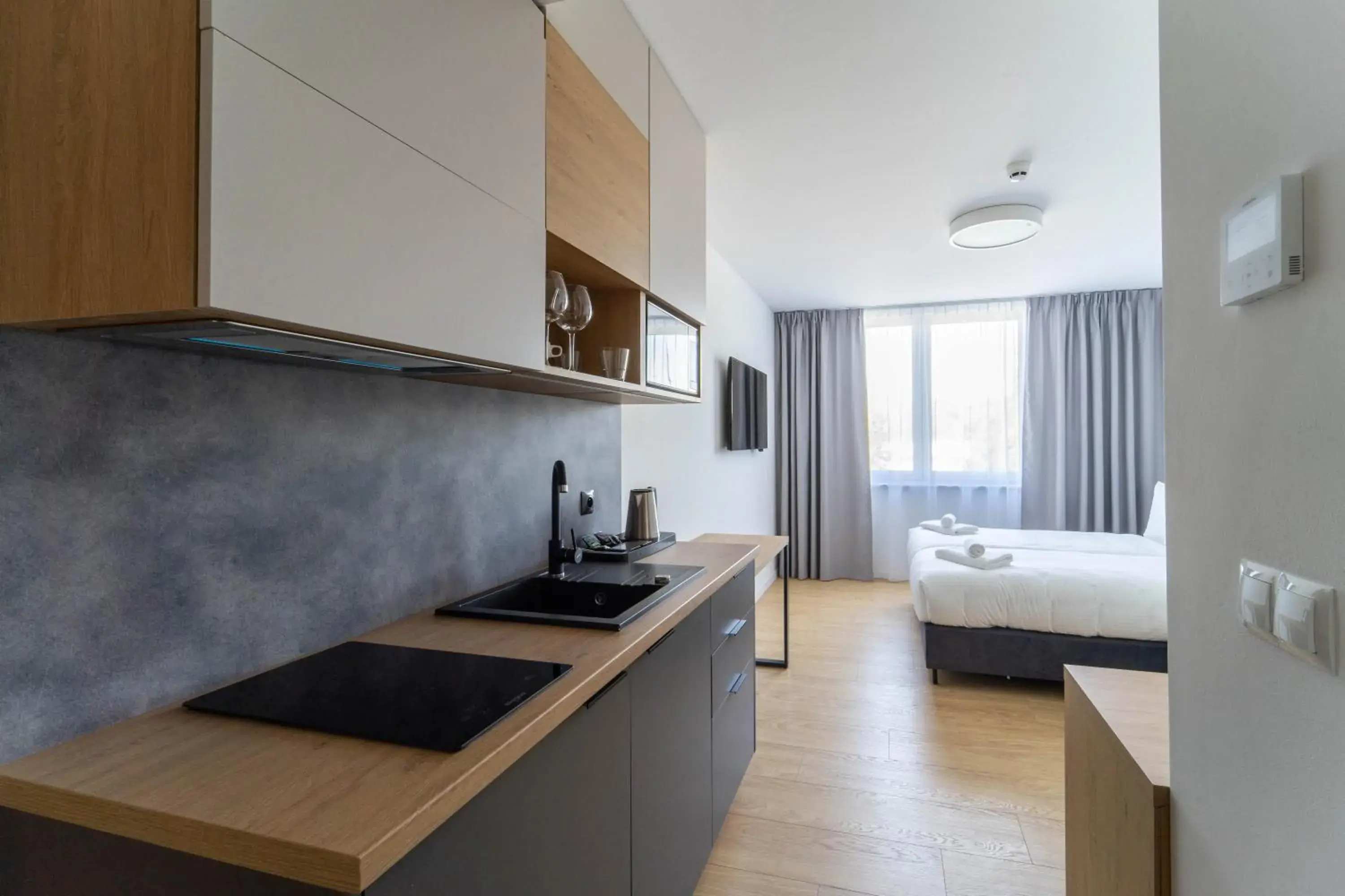 Kitchen or kitchenette, Bed in Milo Aparthotel Kitchen or kitchenette, Bed in Milo Aparthotel