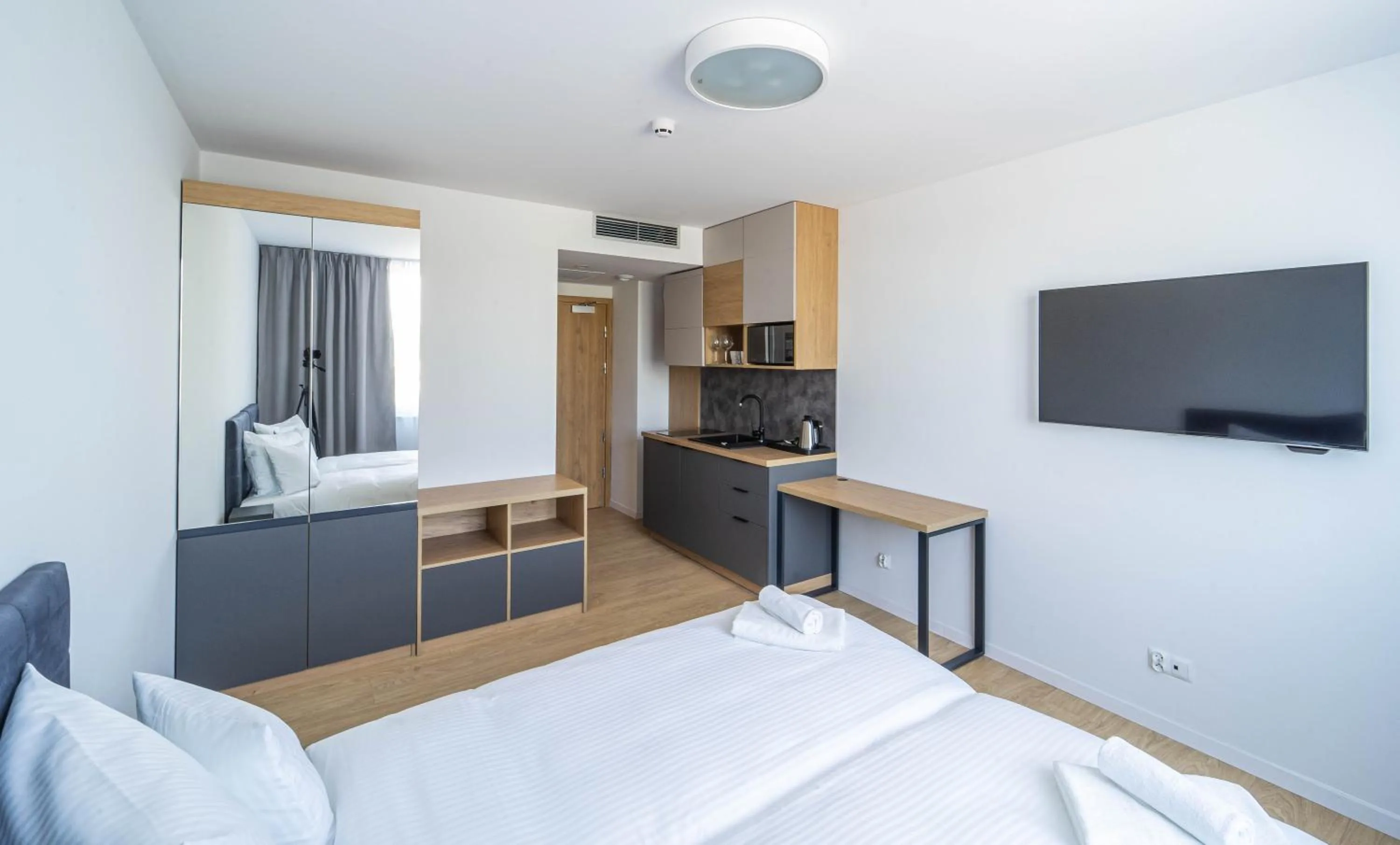 Bed in Milo Aparthotel