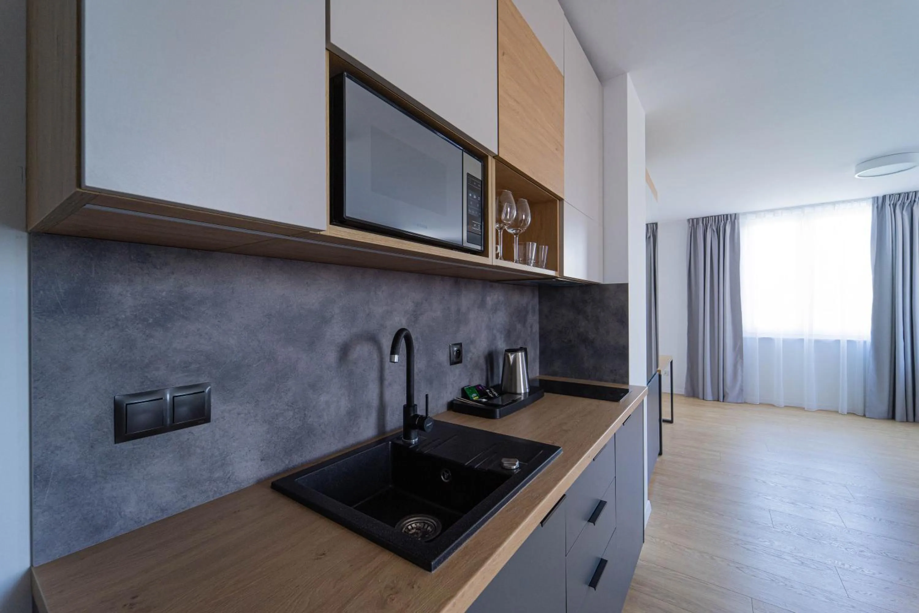 Kitchen or kitchenette in Milo Aparthotel