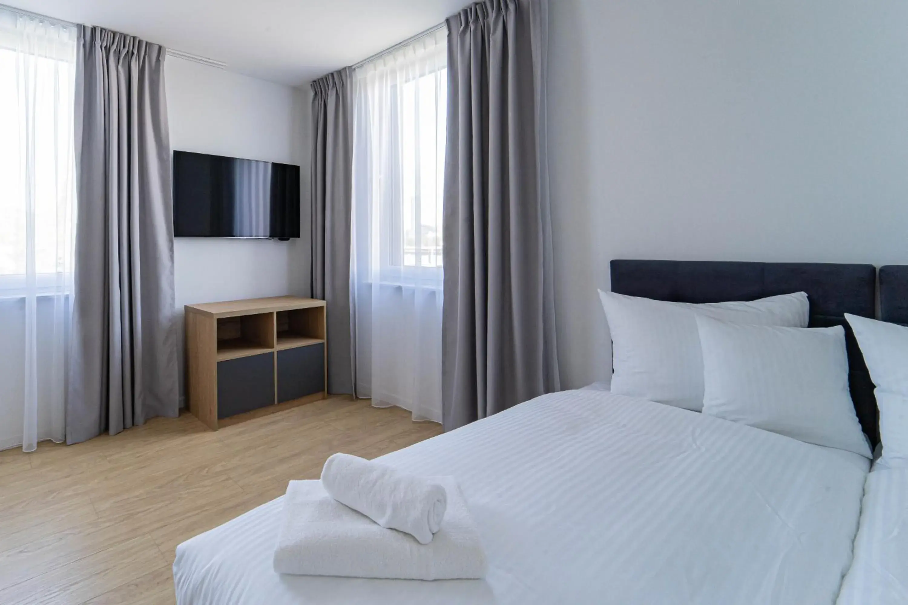 Bed in Milo Aparthotel Bed in Milo Aparthotel