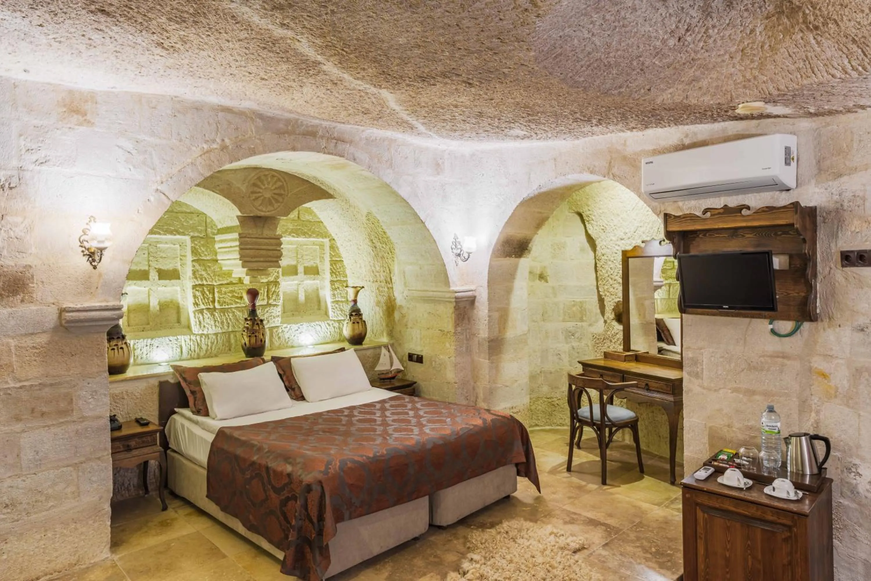 Bed in Phocas Cave Suites