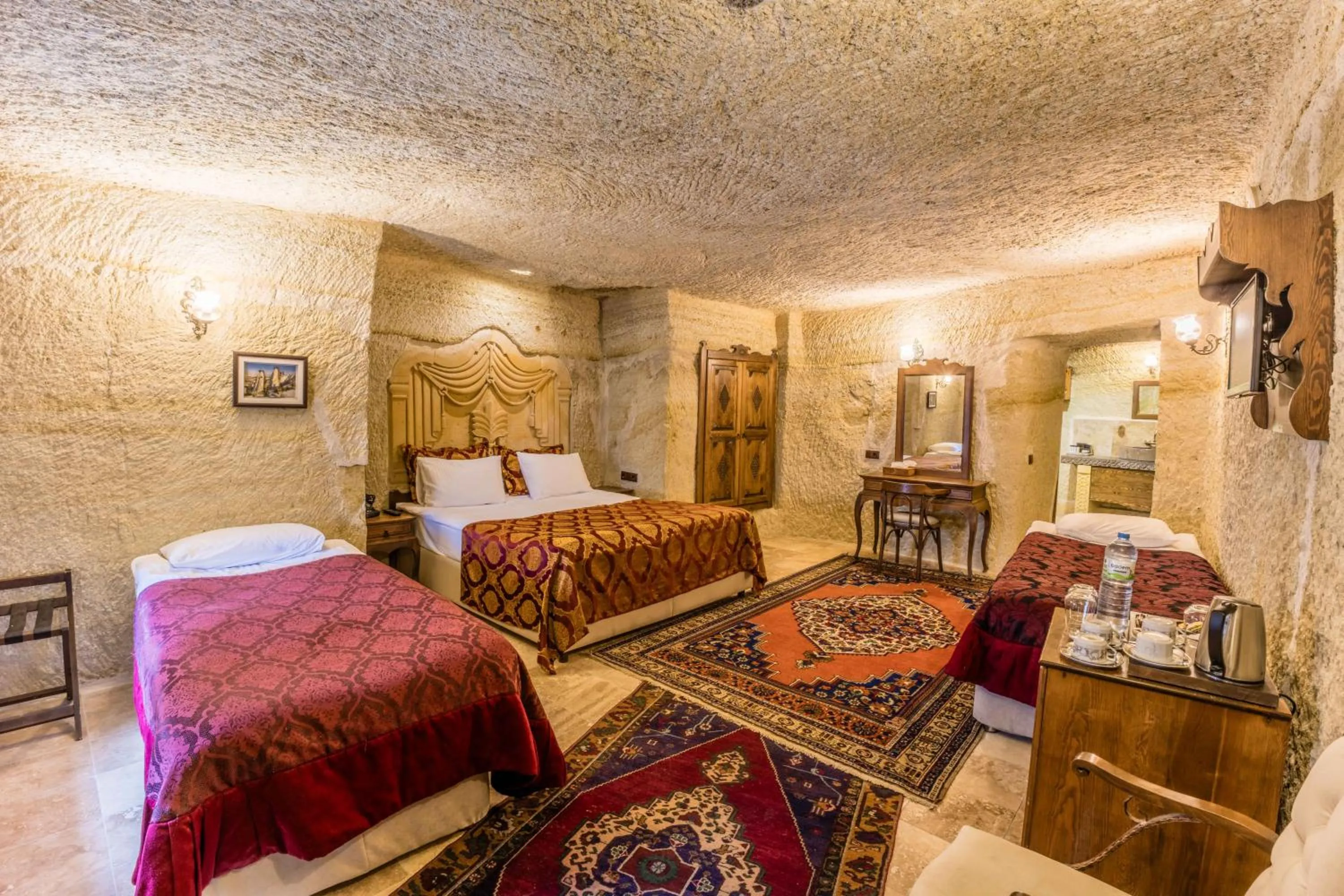 Bed in Phocas Cave Suites