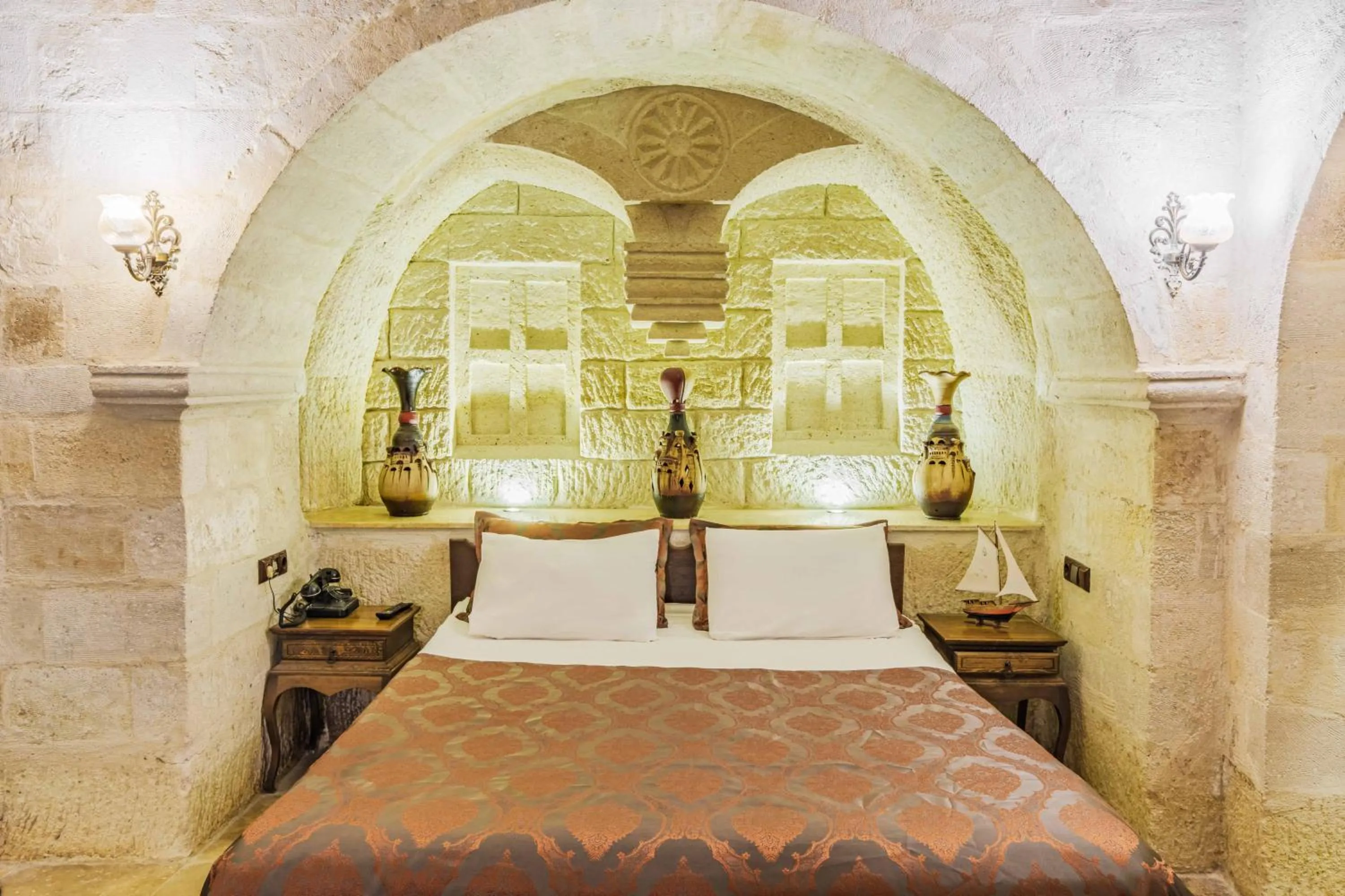 Bed in Phocas Cave Suites