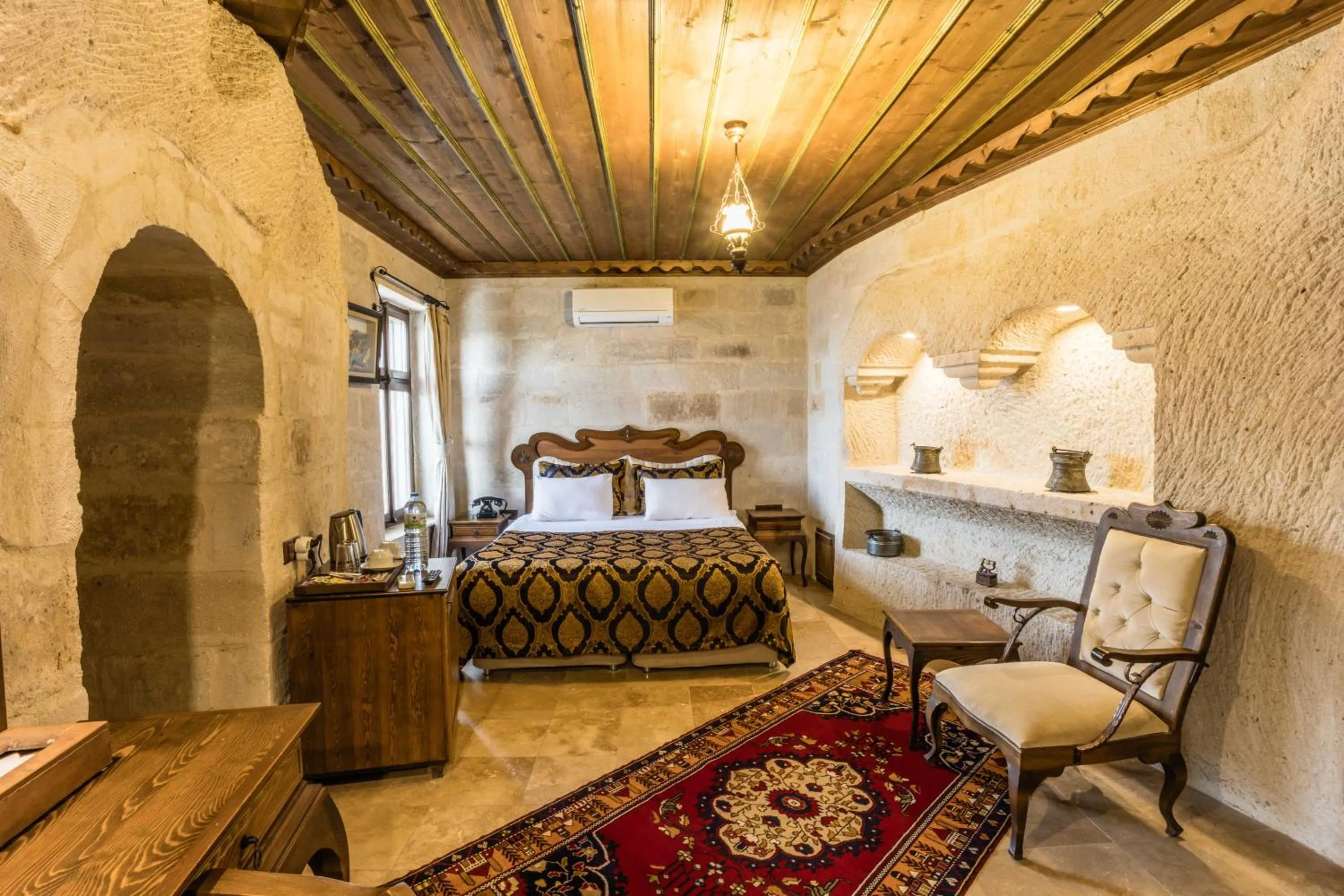 Bed in Phocas Cave Suites
