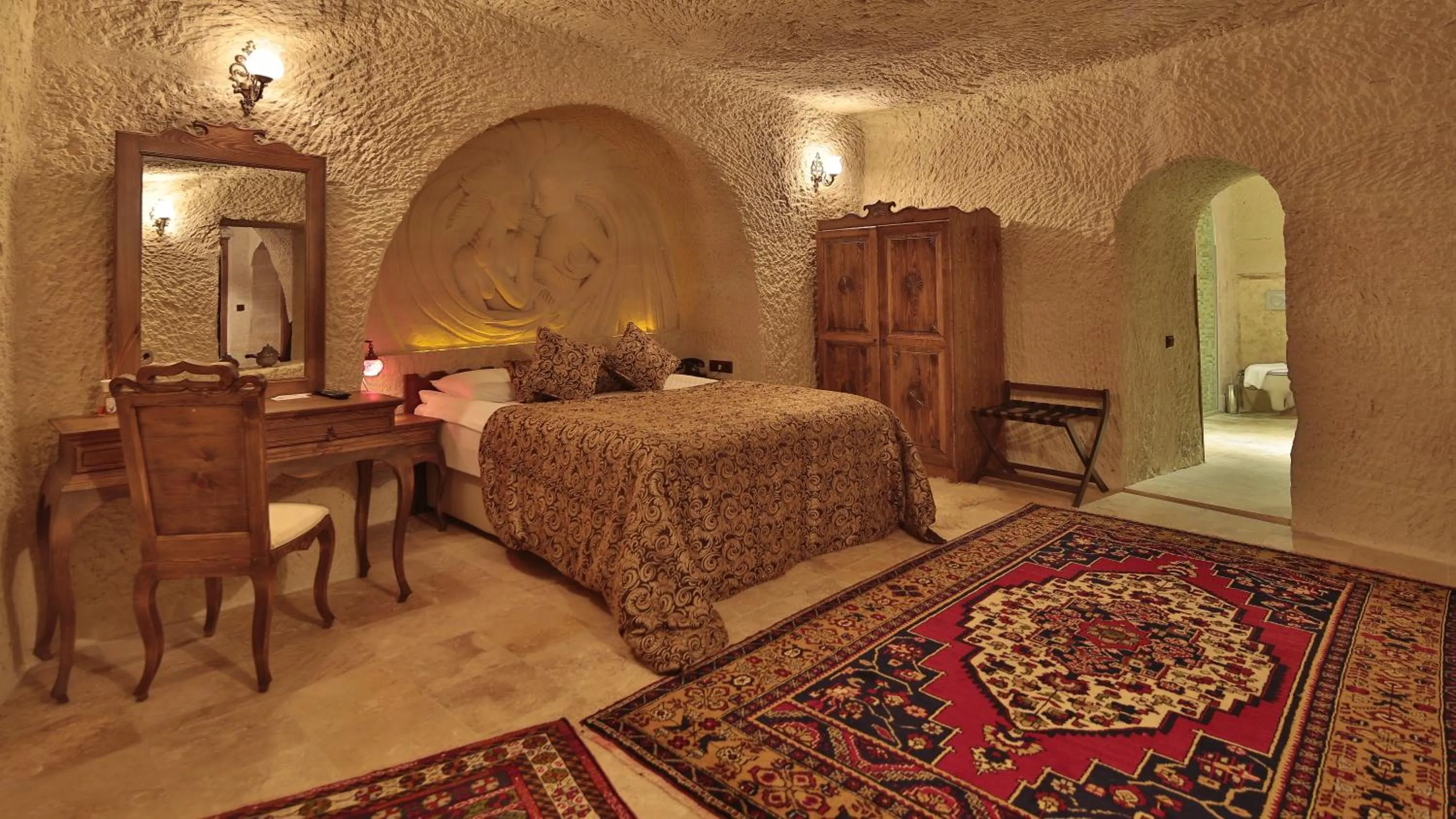 Bed in Phocas Cave Suites