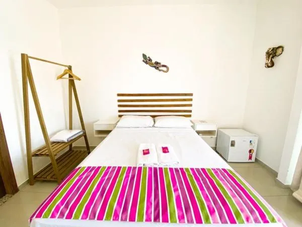 Bed in Pousada Villa Egregora