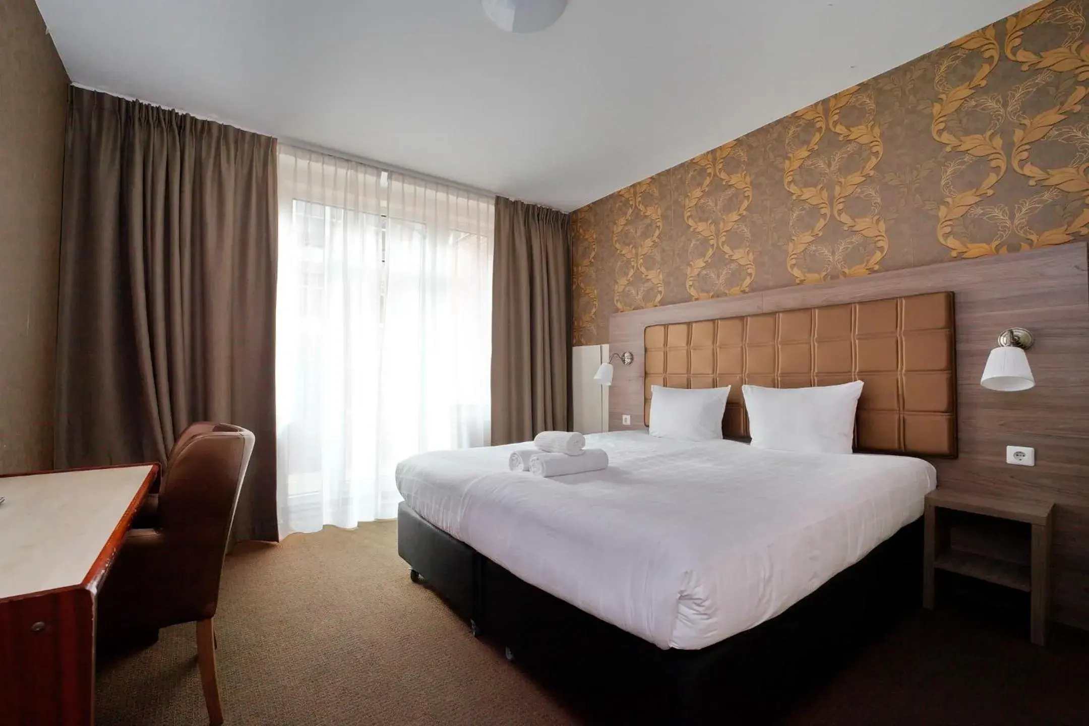 Bed in Aadam Wilhelmina Hotel Bed in Aadam Wilhelmina Hotel