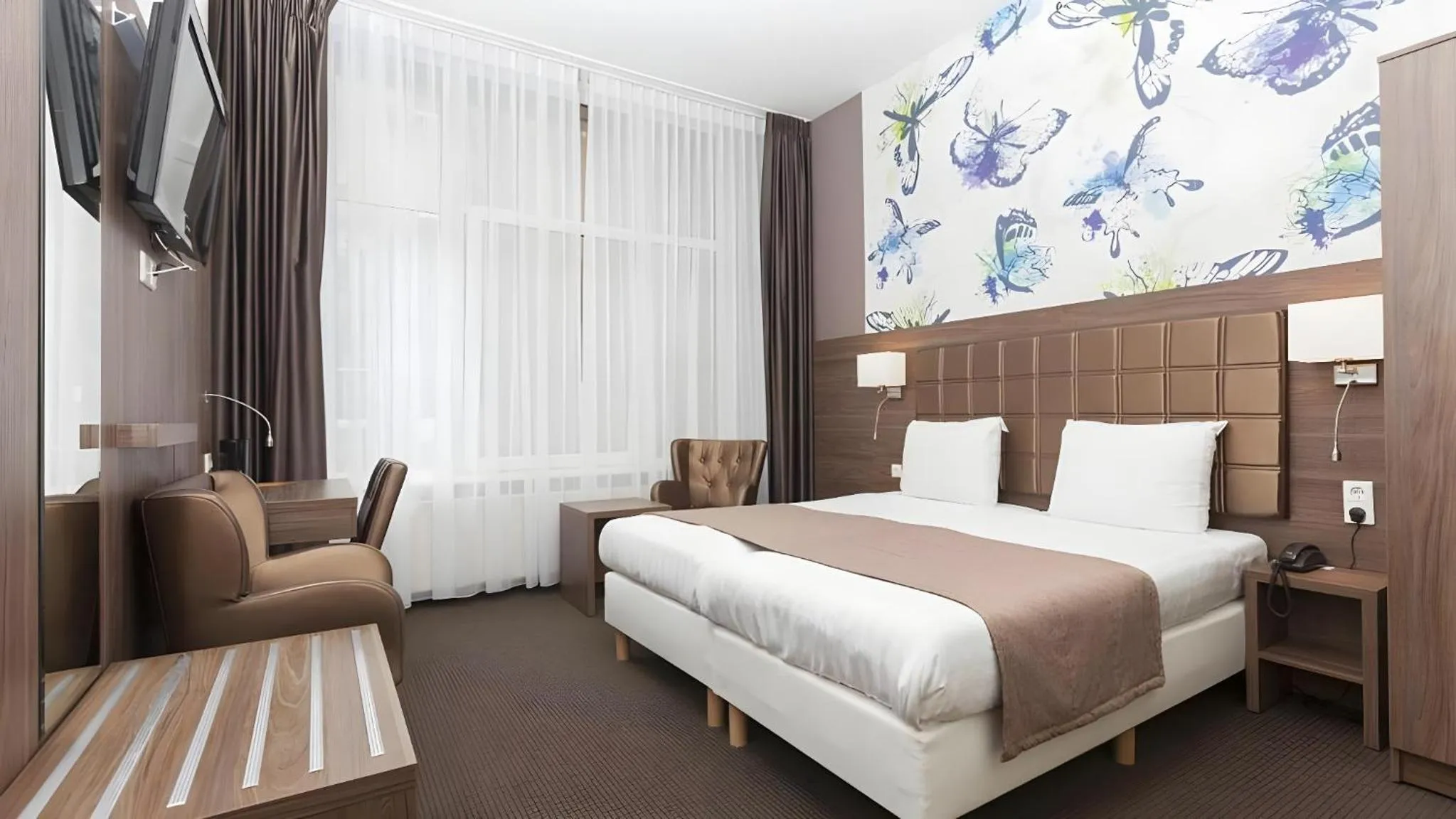 Bed in Aadam Wilhelmina Hotel