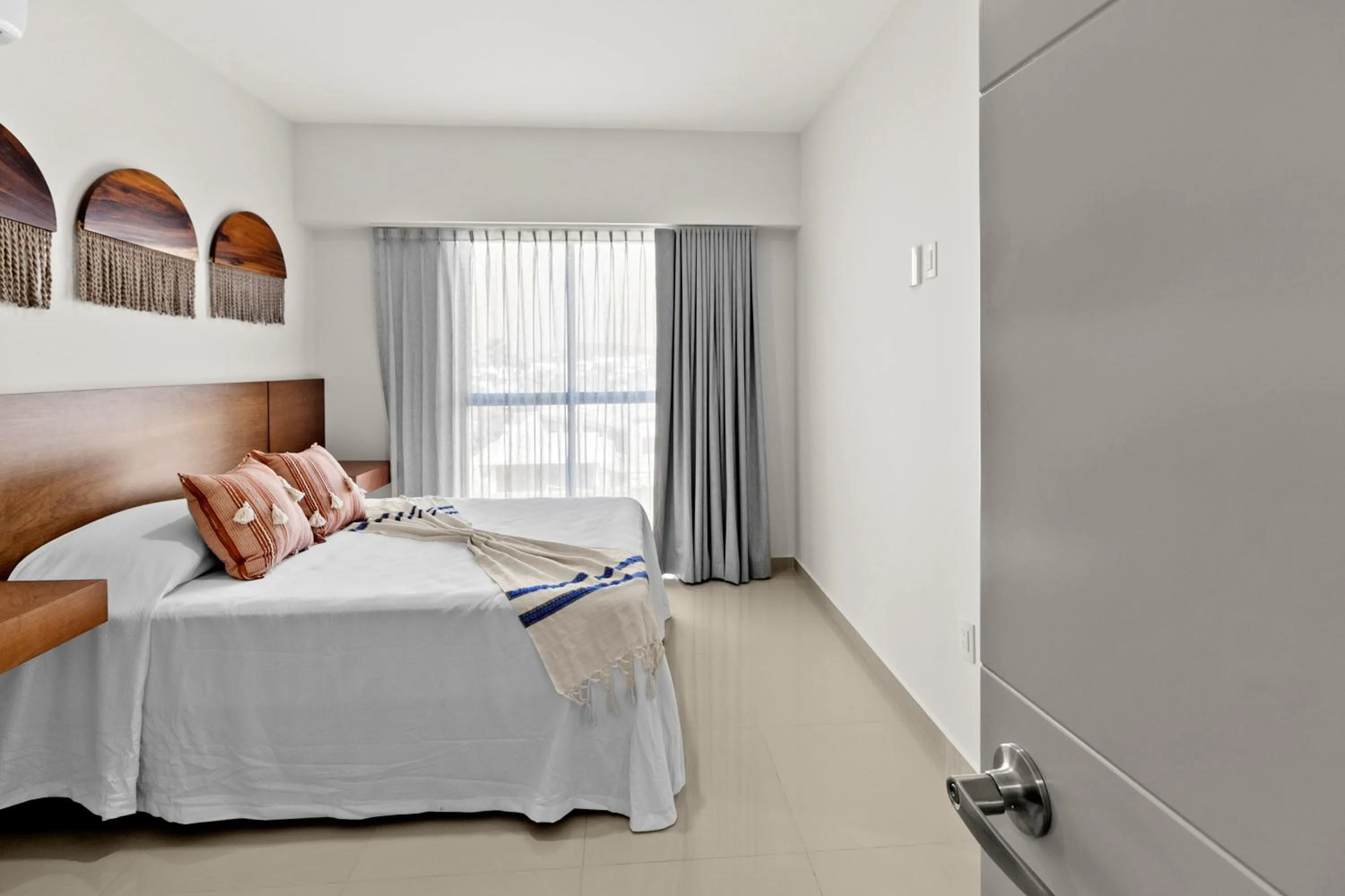 Bed in Casa Barros Vacation Condos