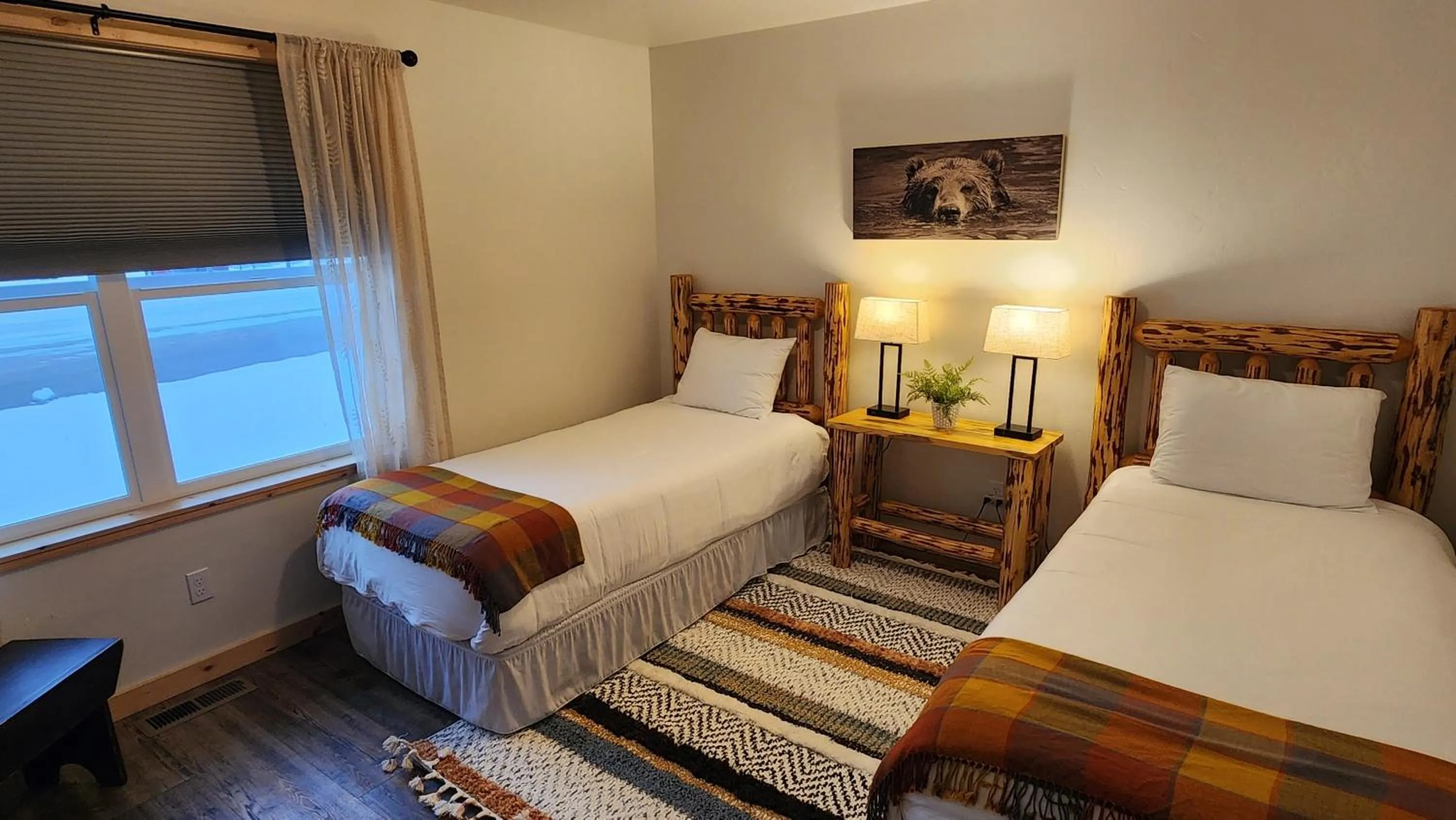 Bed in Beargrass Lodging & RV Resort