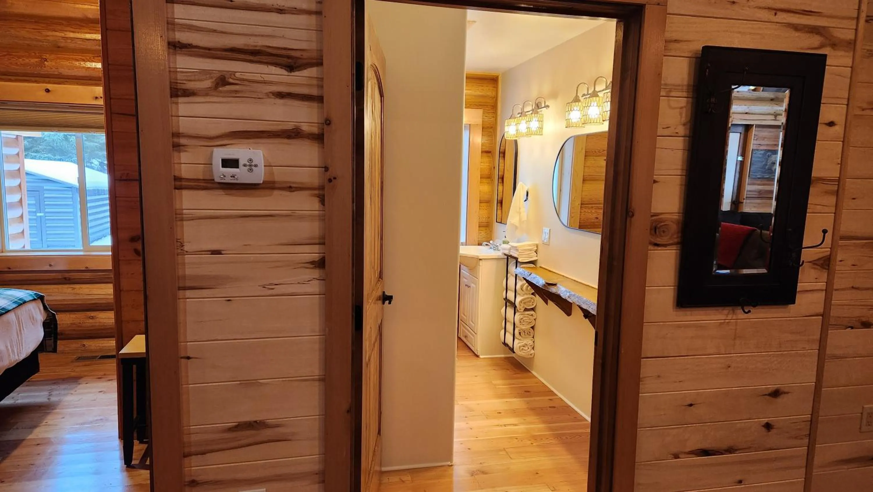 Toilet, Bed in Beargrass Lodging & RV Resort
