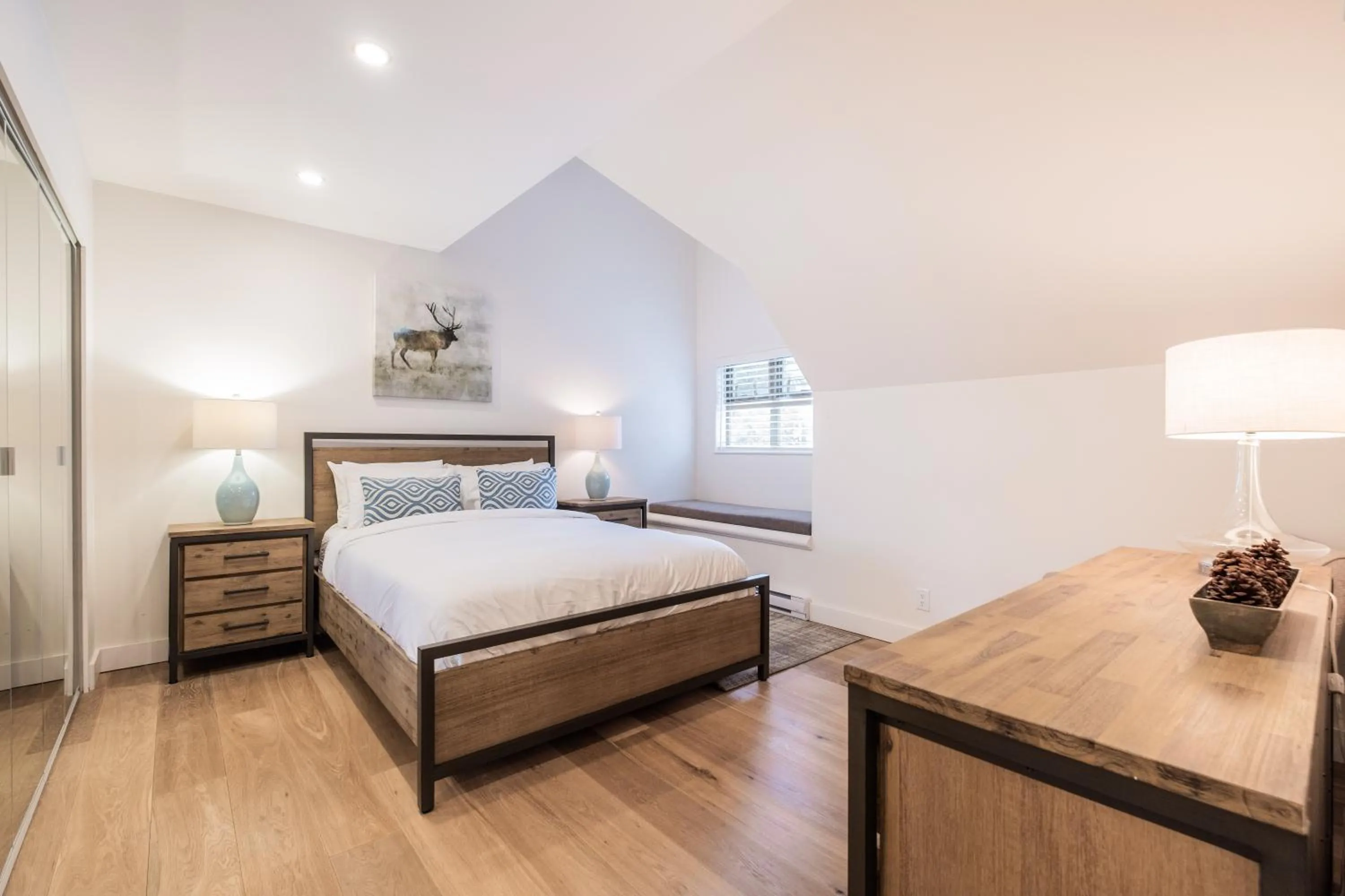 Bed in Lake Placid Lodge by Outpost Whistler