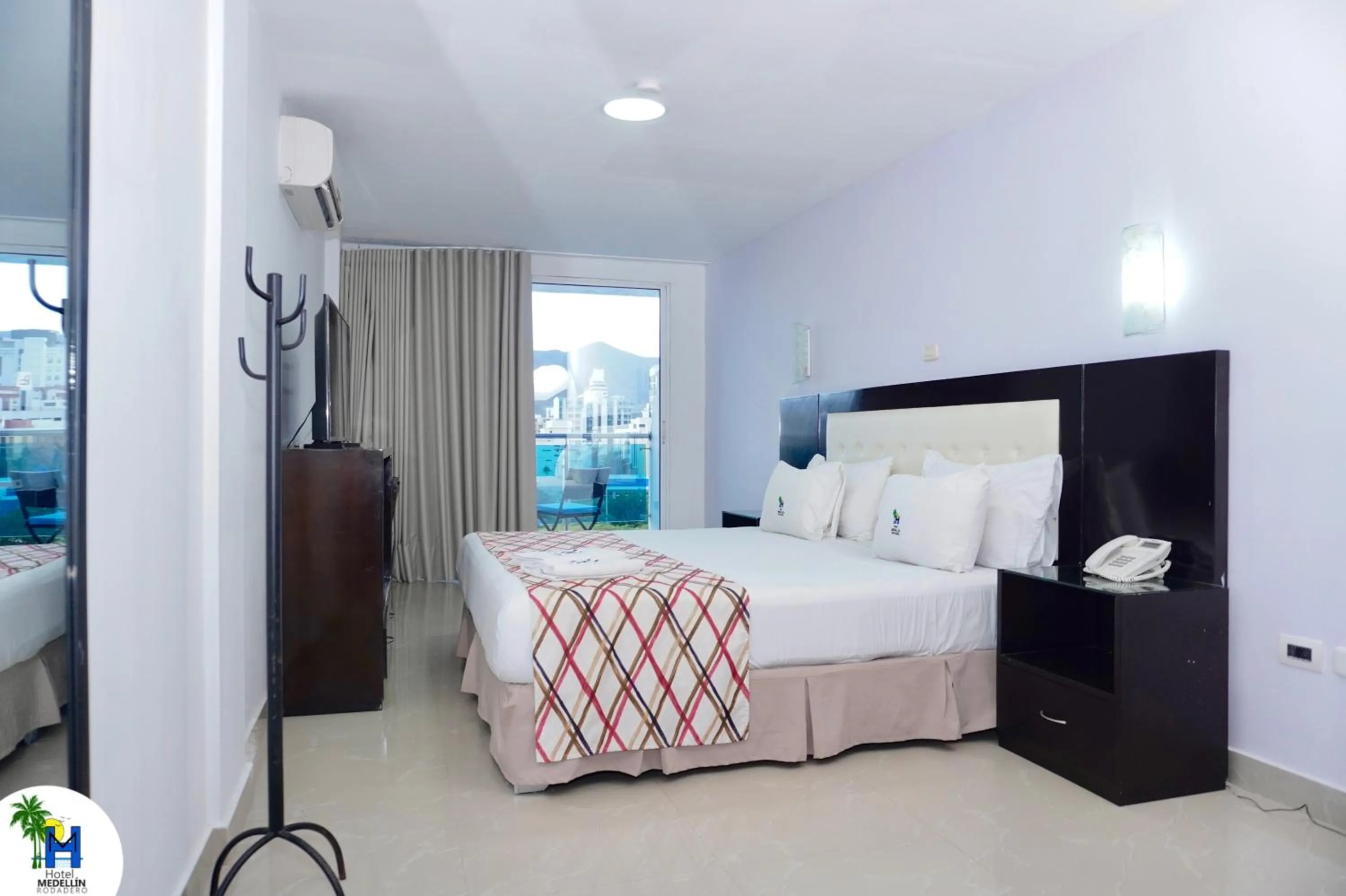 Photo of the whole room, Bed in Hotel Medellín Rodadero