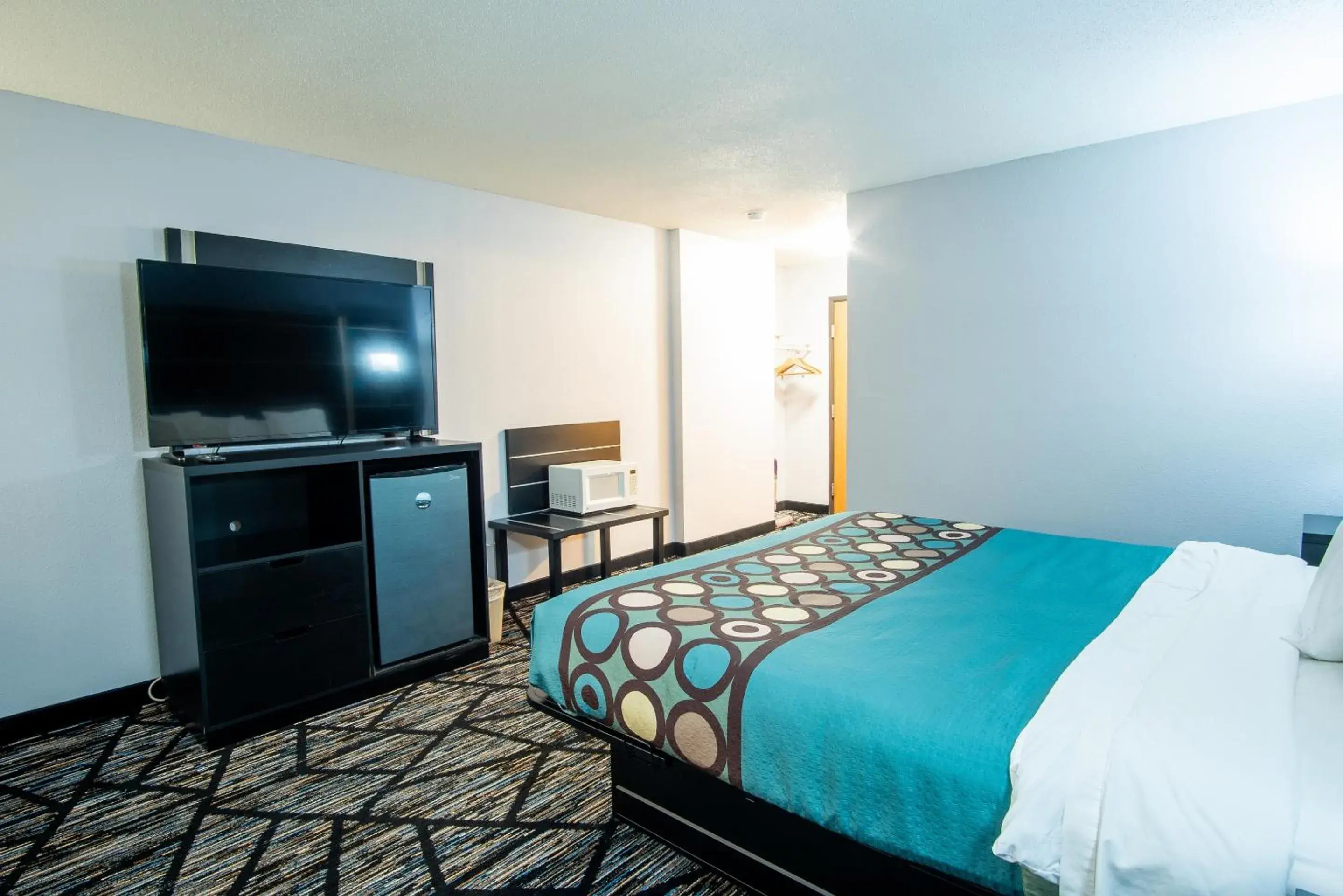 View (from property/room), Bed in Coratel Inn & Suites by Jasper New Richmond View (from property/room), Bed in Coratel Inn & Suites by Jasper New Richmond