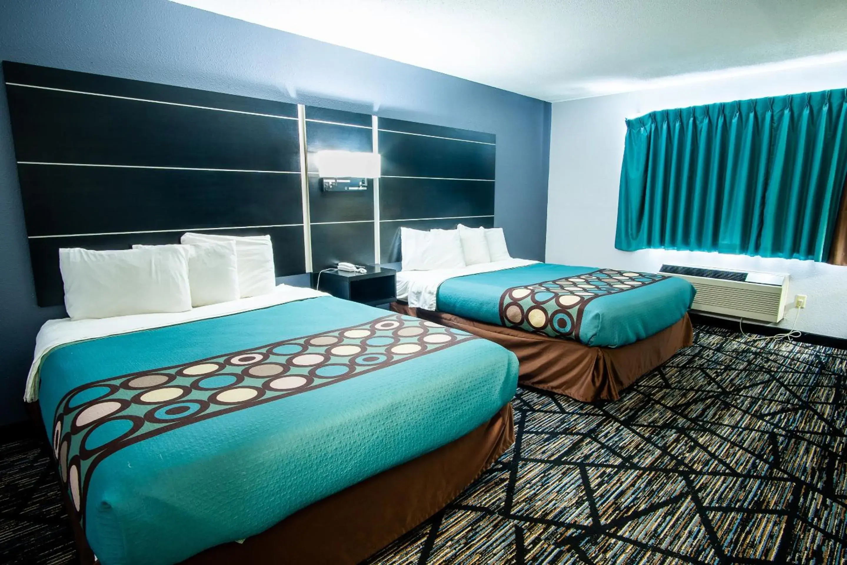 Deluxe Queen Room in Coratel Inn & Suites by Jasper New Richmond Deluxe Queen Room in Coratel Inn & Suites by Jasper New Richmond