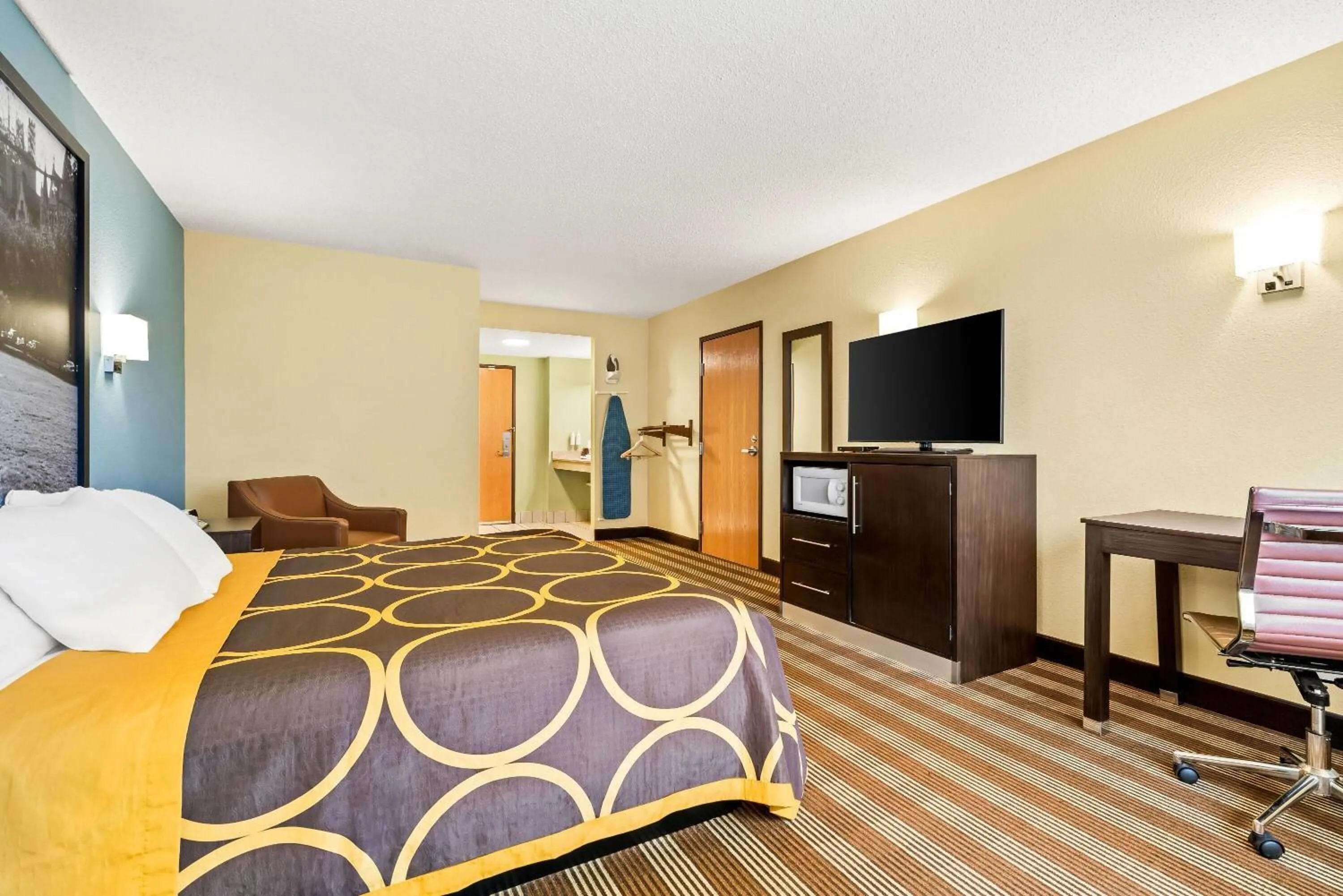 Bed in Super 8 by Wyndham Osseo WI