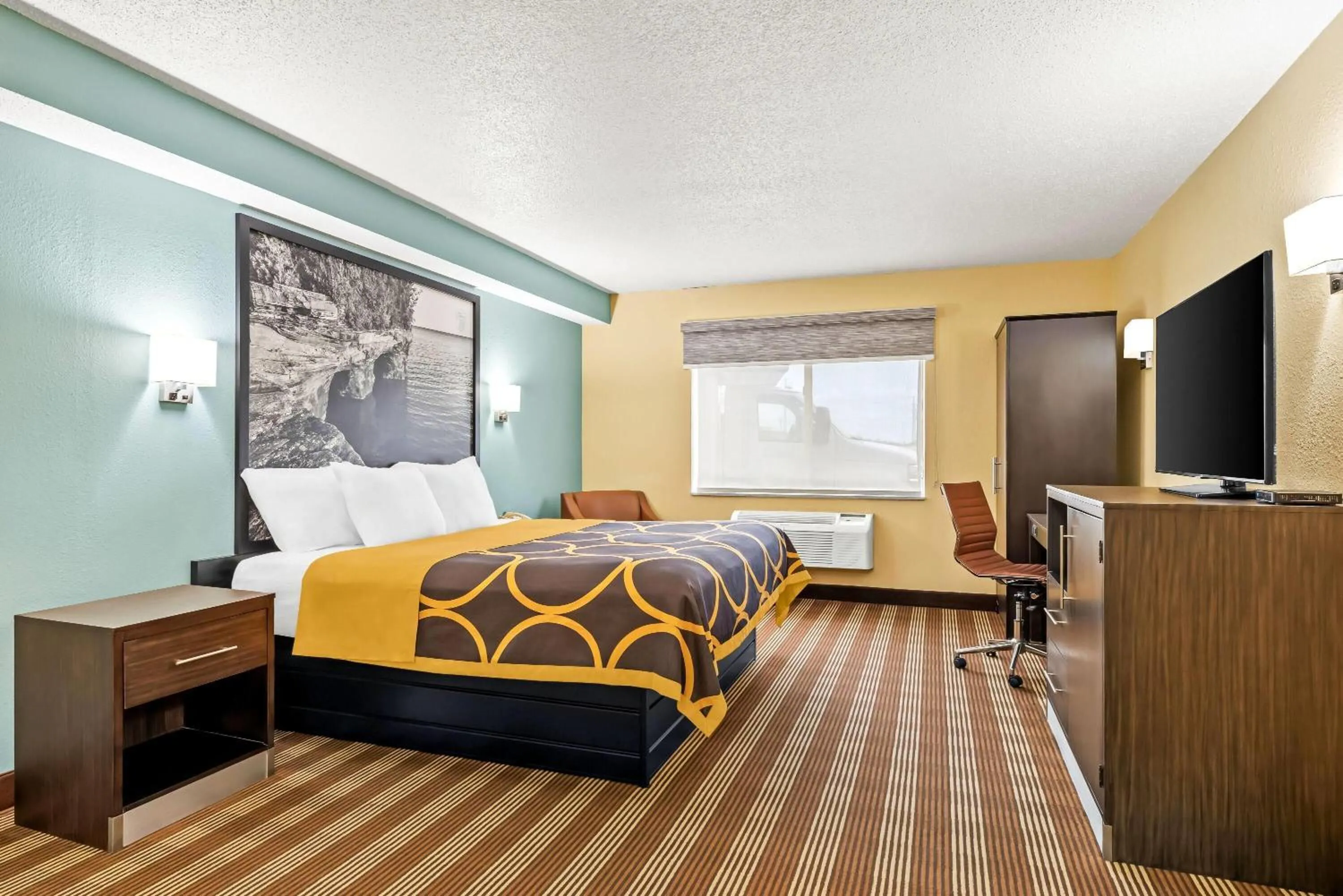 Bed in Super 8 by Wyndham Osseo WI