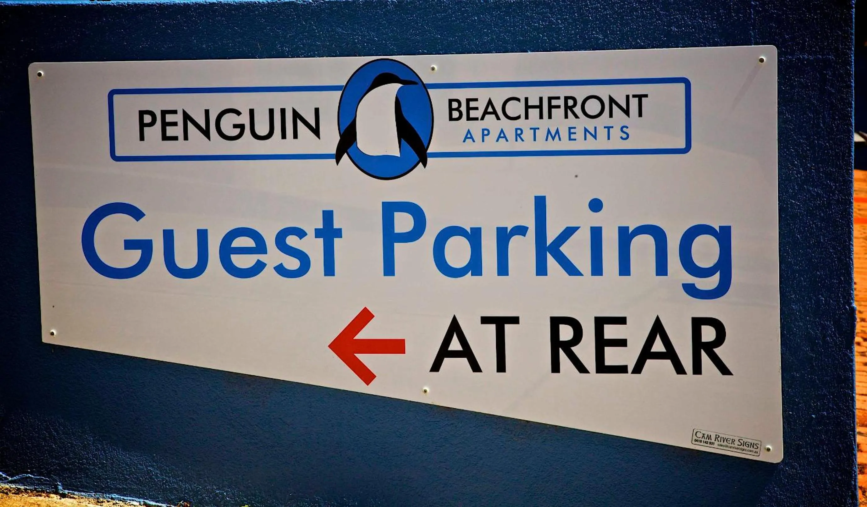 Property logo or sign in Penguin Beachfront Apartments