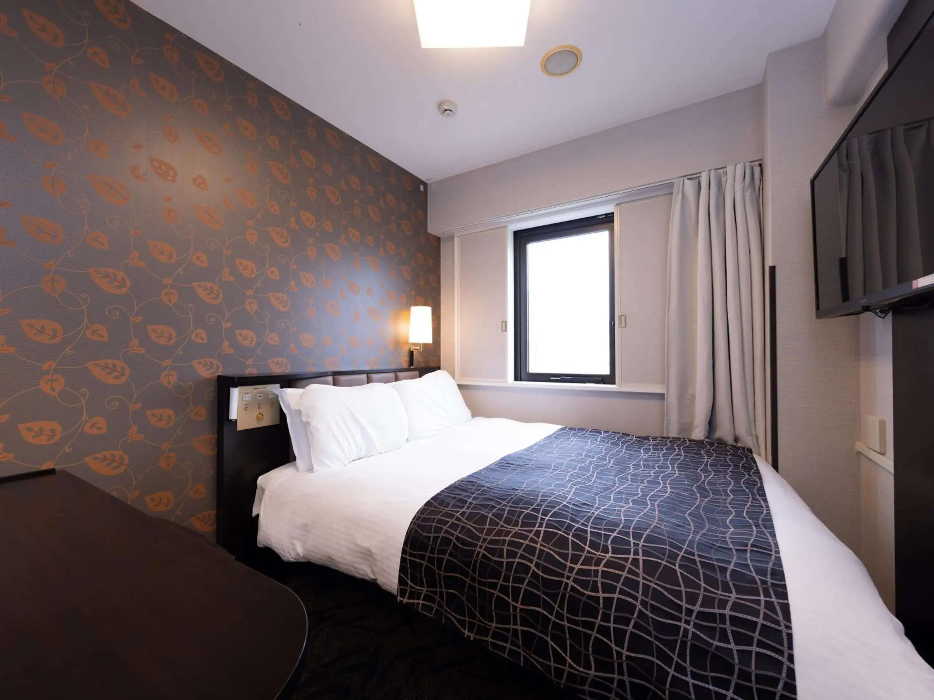 Bed in APA Hotel Aomori Ekihigashi Bed in APA Hotel Aomori Ekihigashi