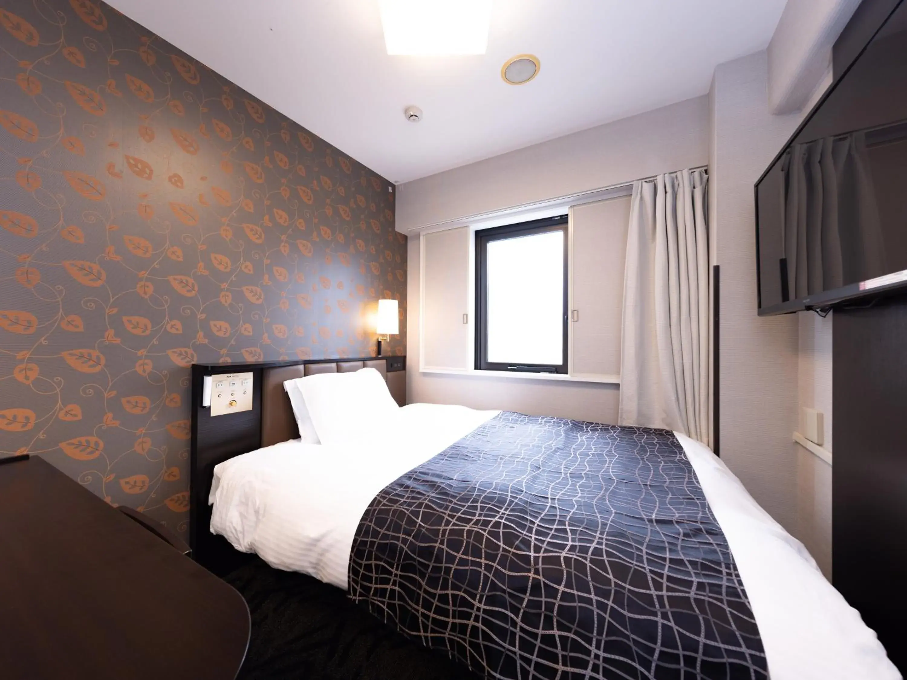 Bed in APA Hotel Aomori Ekihigashi Bed in APA Hotel Aomori Ekihigashi