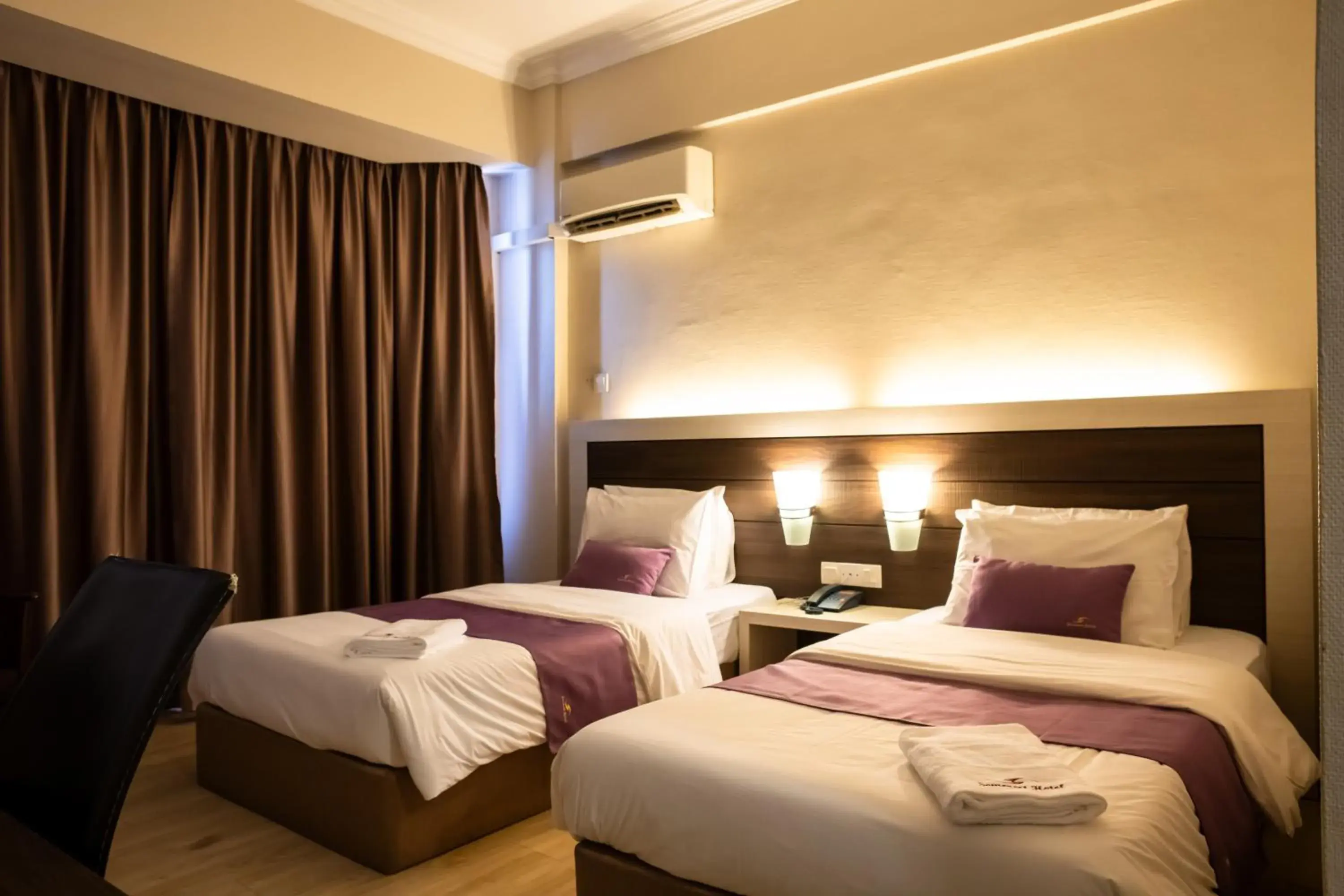 Bed in Somerset Hotel Bed in Somerset Hotel