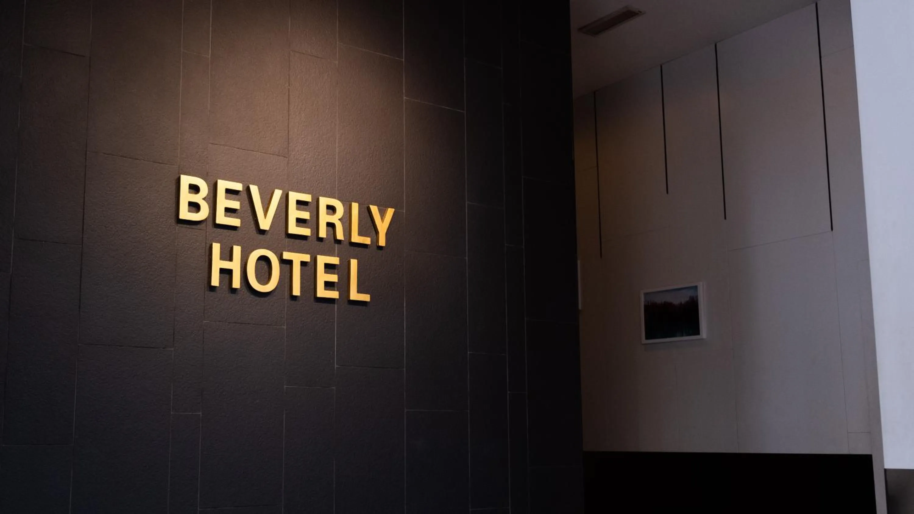 Property logo or sign in Beverly Hotel