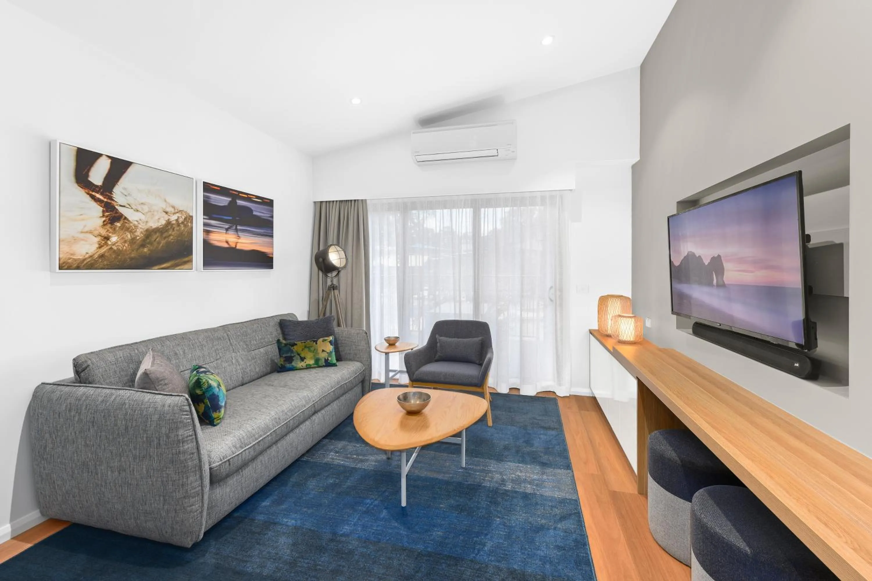 Living room in Club Wyndham Flynns Beach, Trademark Collection by Wyndham