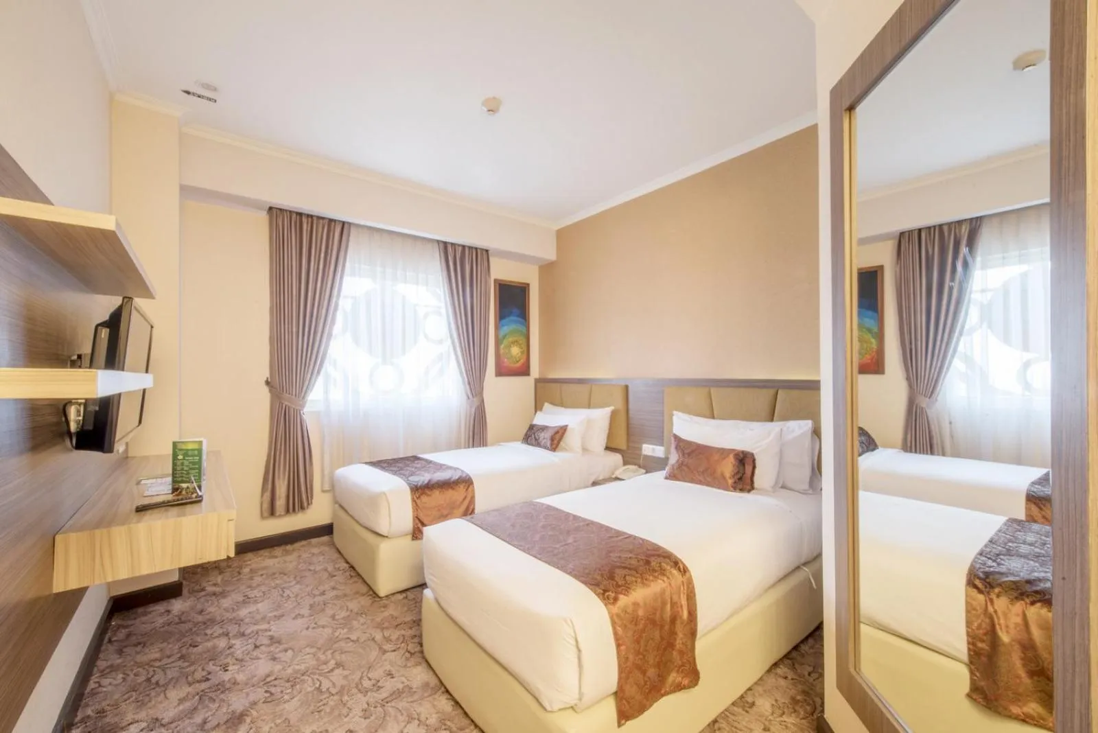 Bed in Lorin Syariah Solo Hotel