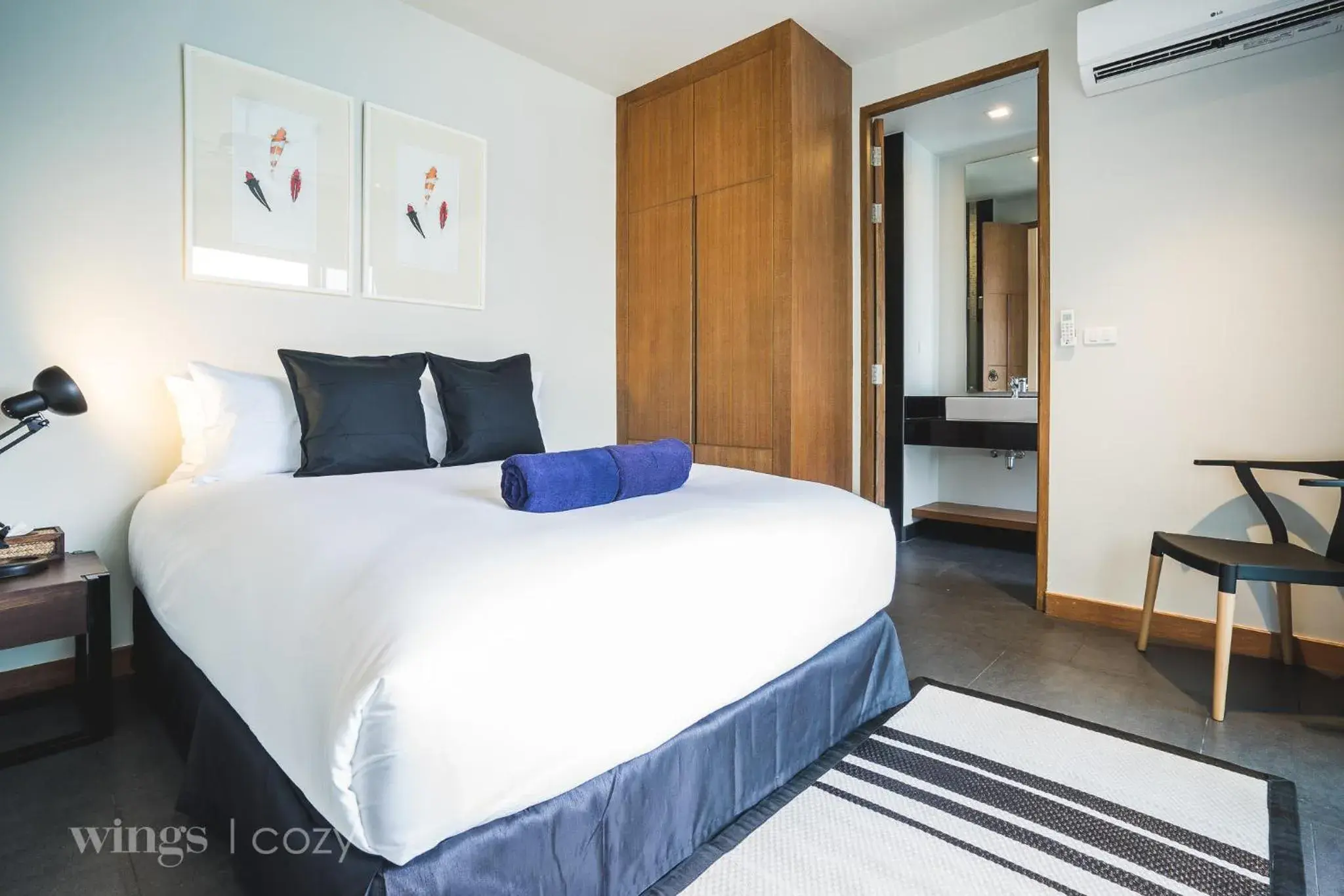 Text overlay, Bed in Wings Phuket Villa by Two Villas HOLIDAY Text overlay, Bed in Wings Phuket Villa by Two Villas HOLIDAY