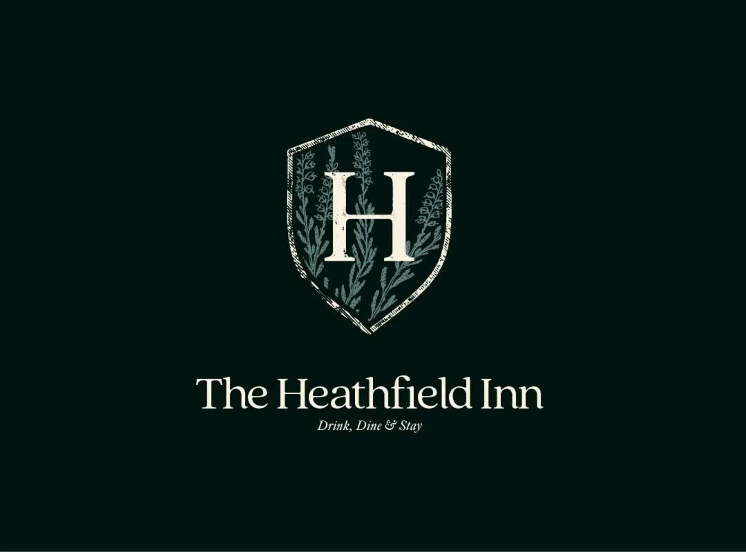 Property logo or sign in The Heathfield Inn