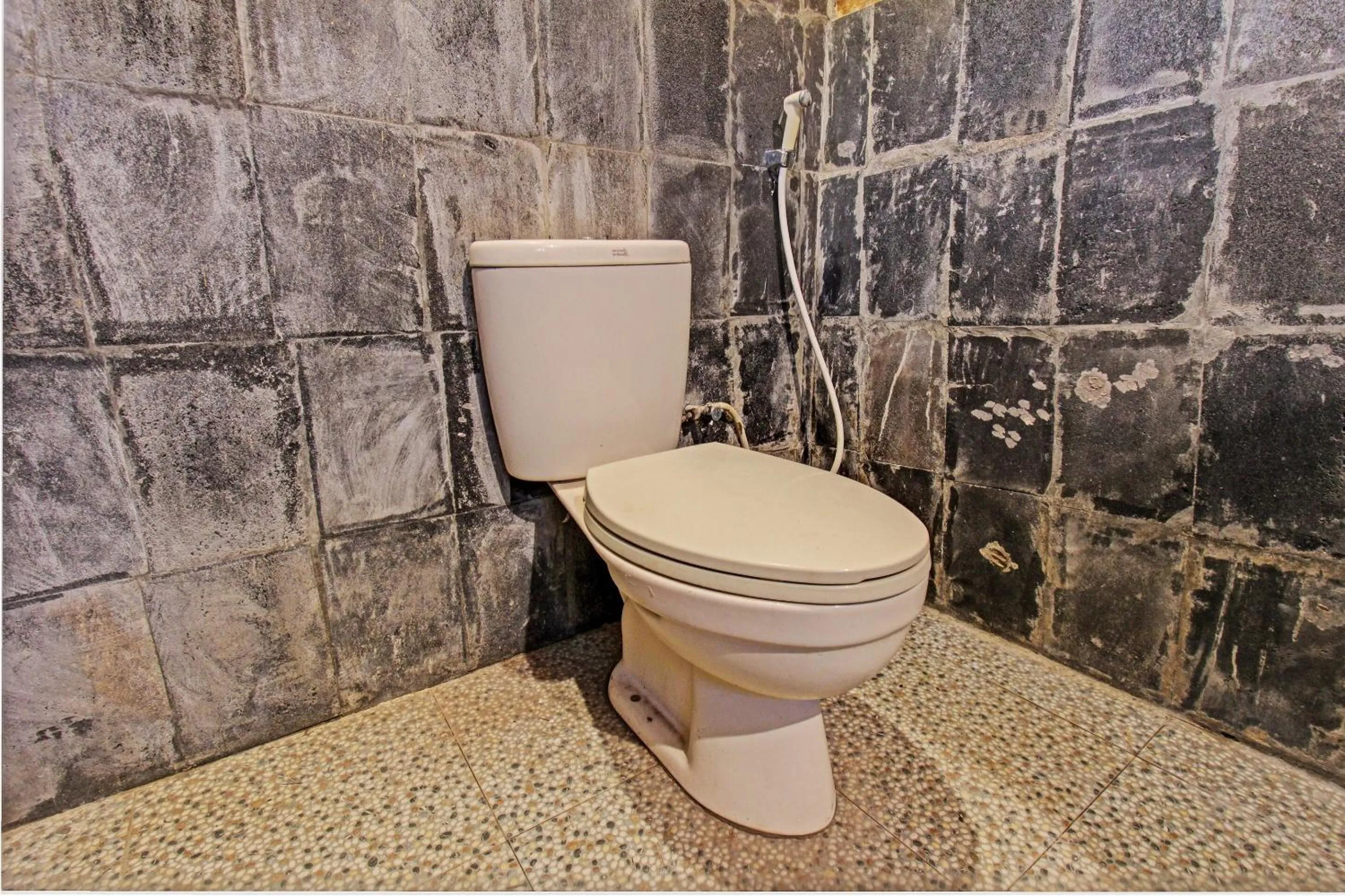 Bathroom in OYO 93121 Abi Bungalow & Hostel