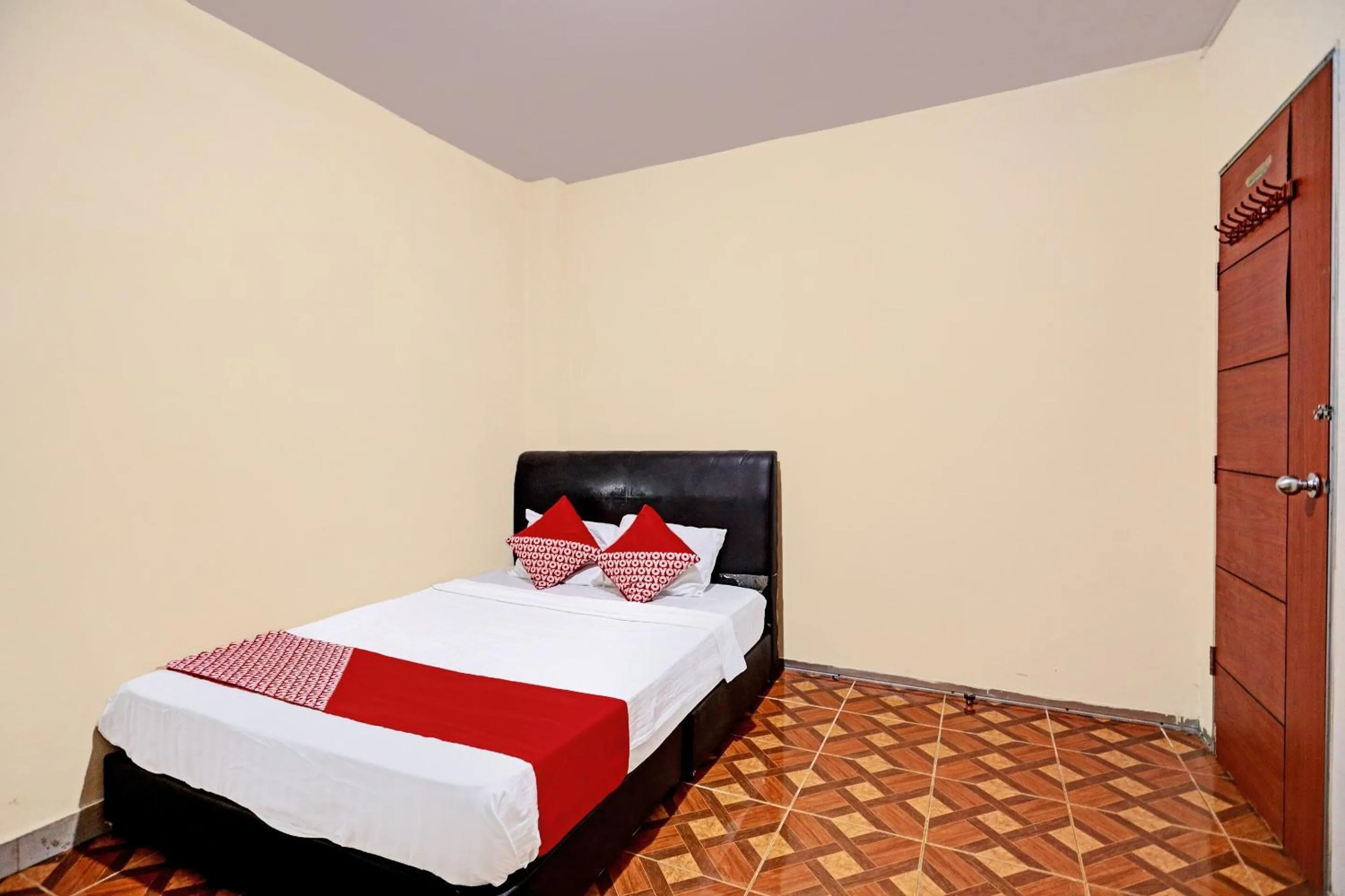 Bedroom in OYO 92553 Caitlin Homestay