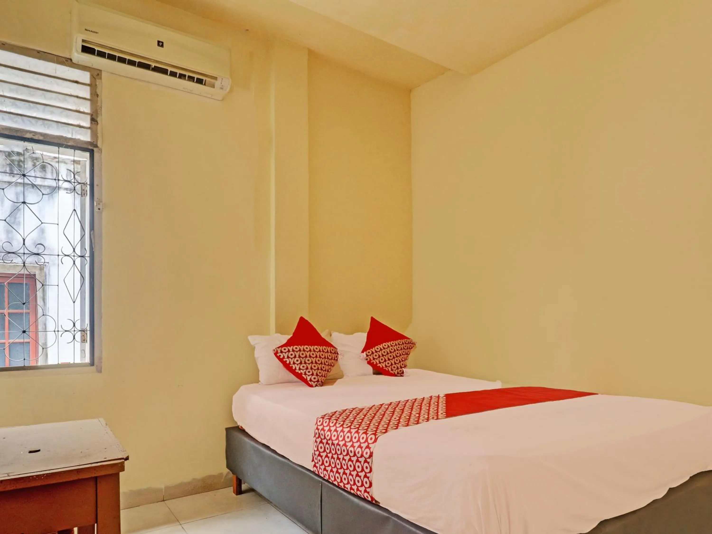 Bedroom, Bed in Hotel O Excellent Kost