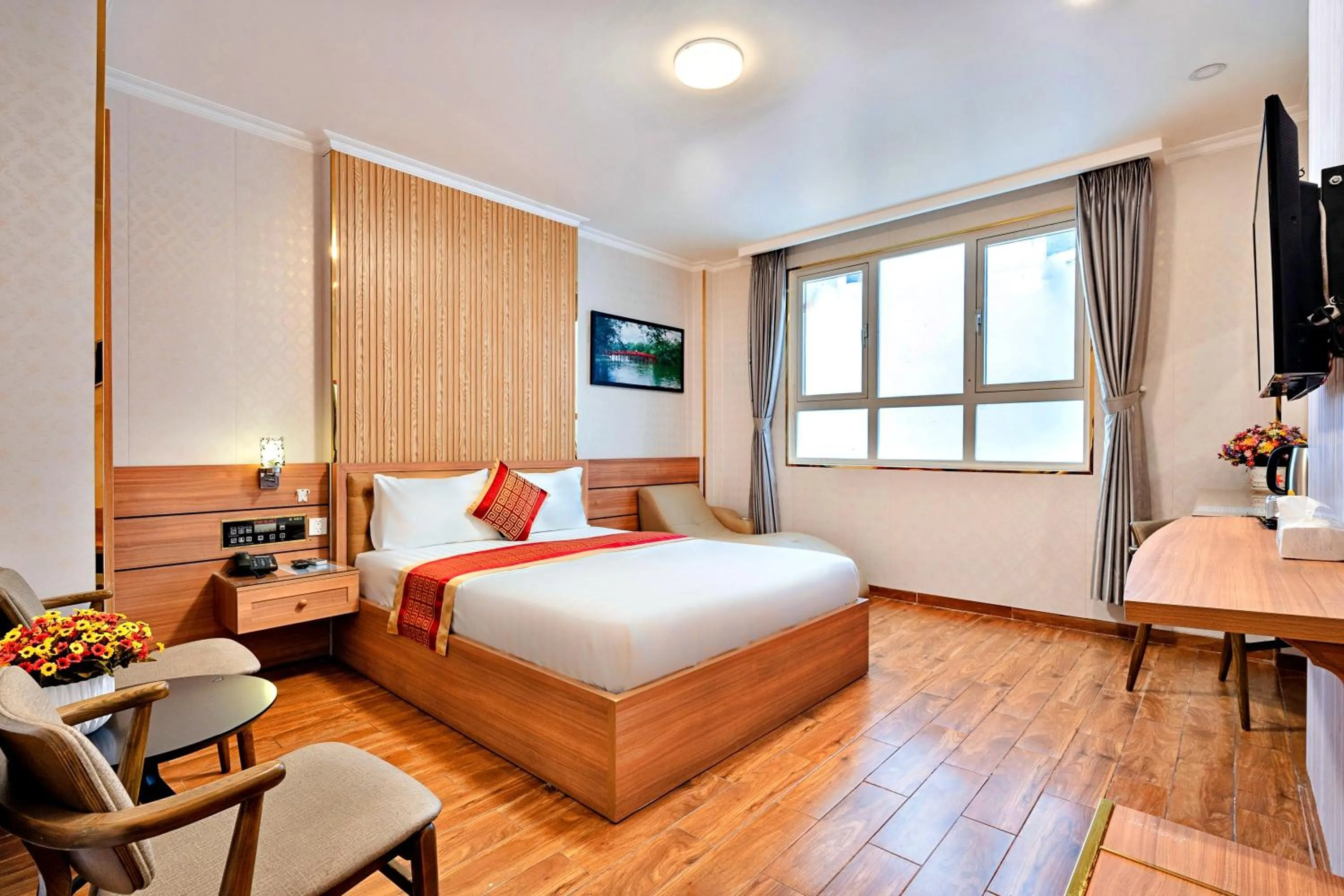 Photo of the whole room, Bed in Luna Saigon Hotel - Bui Vien Walking Street