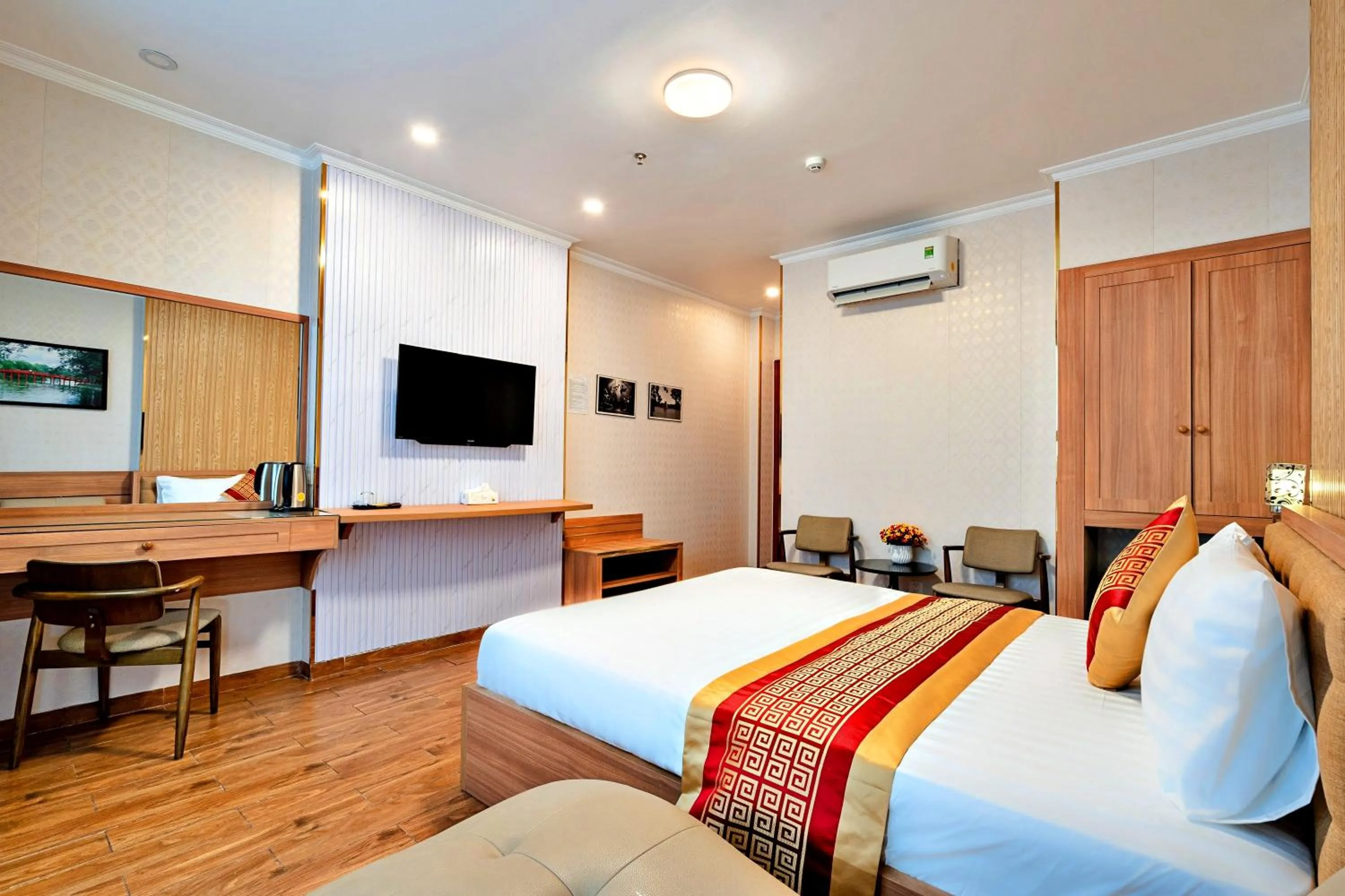 Photo of the whole room, Bed in Luna Saigon Hotel - Bui Vien Walking Street