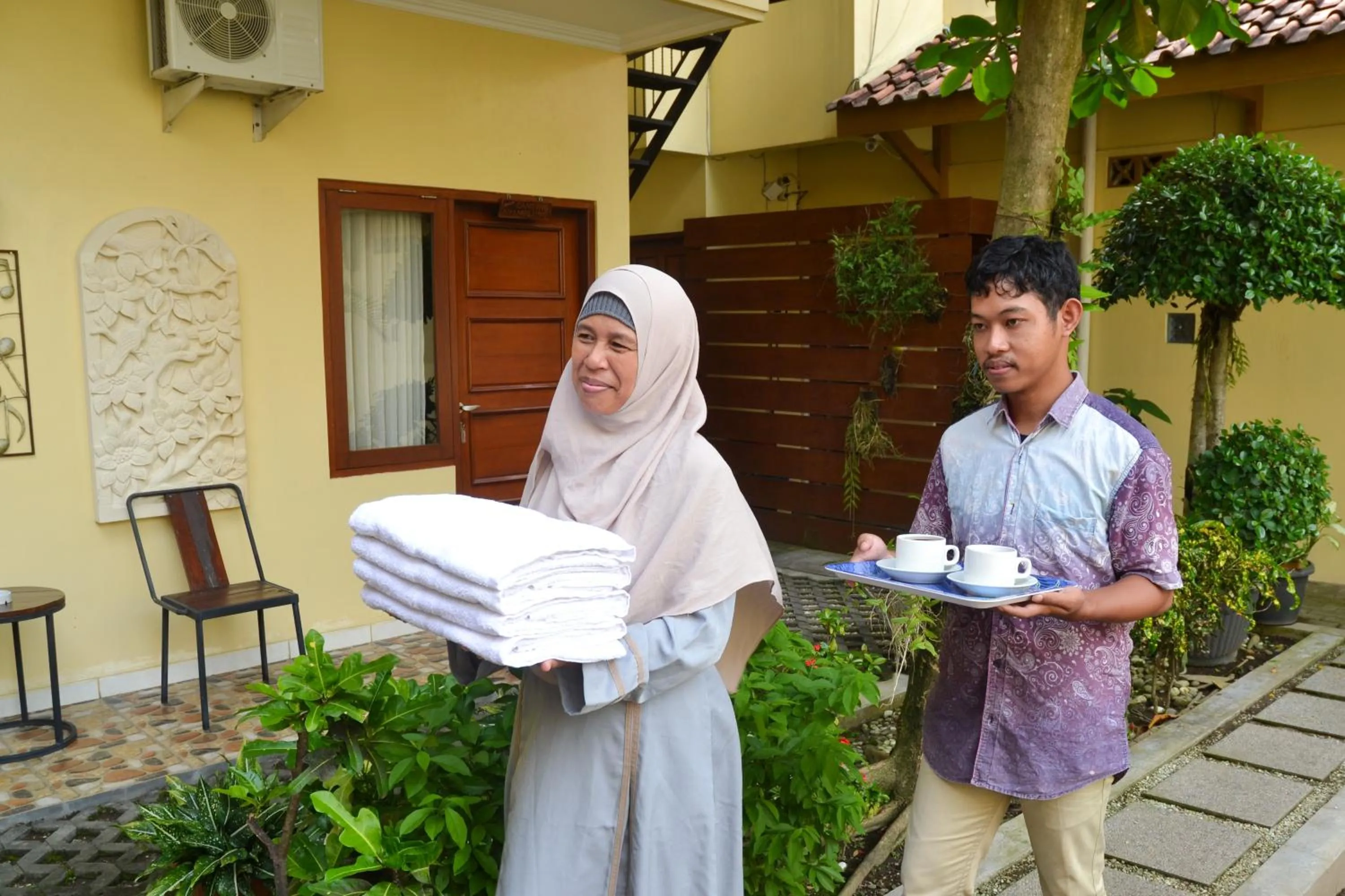 Staff in Roemah Canting Homestay