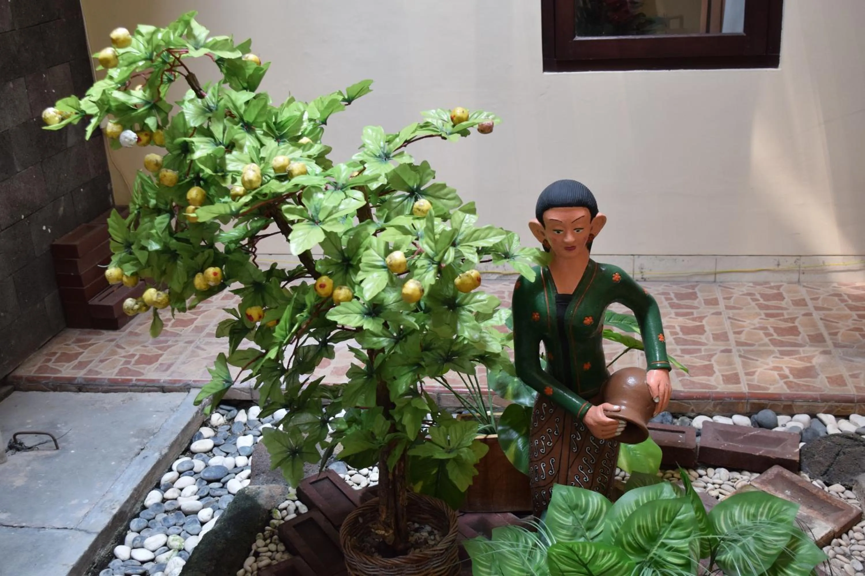 Staff in Roemah Canting Homestay