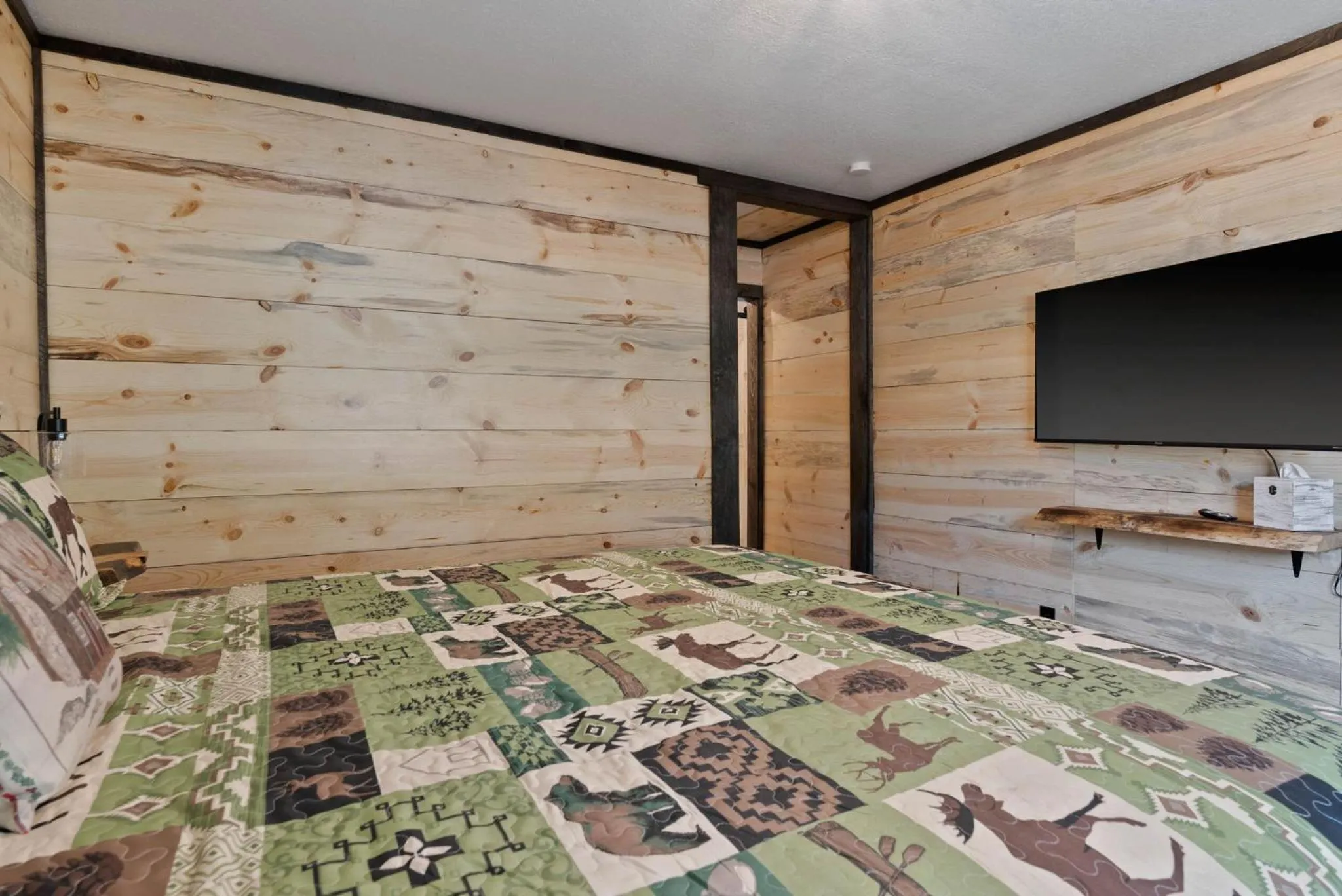 Bed in Lake Village Lodge