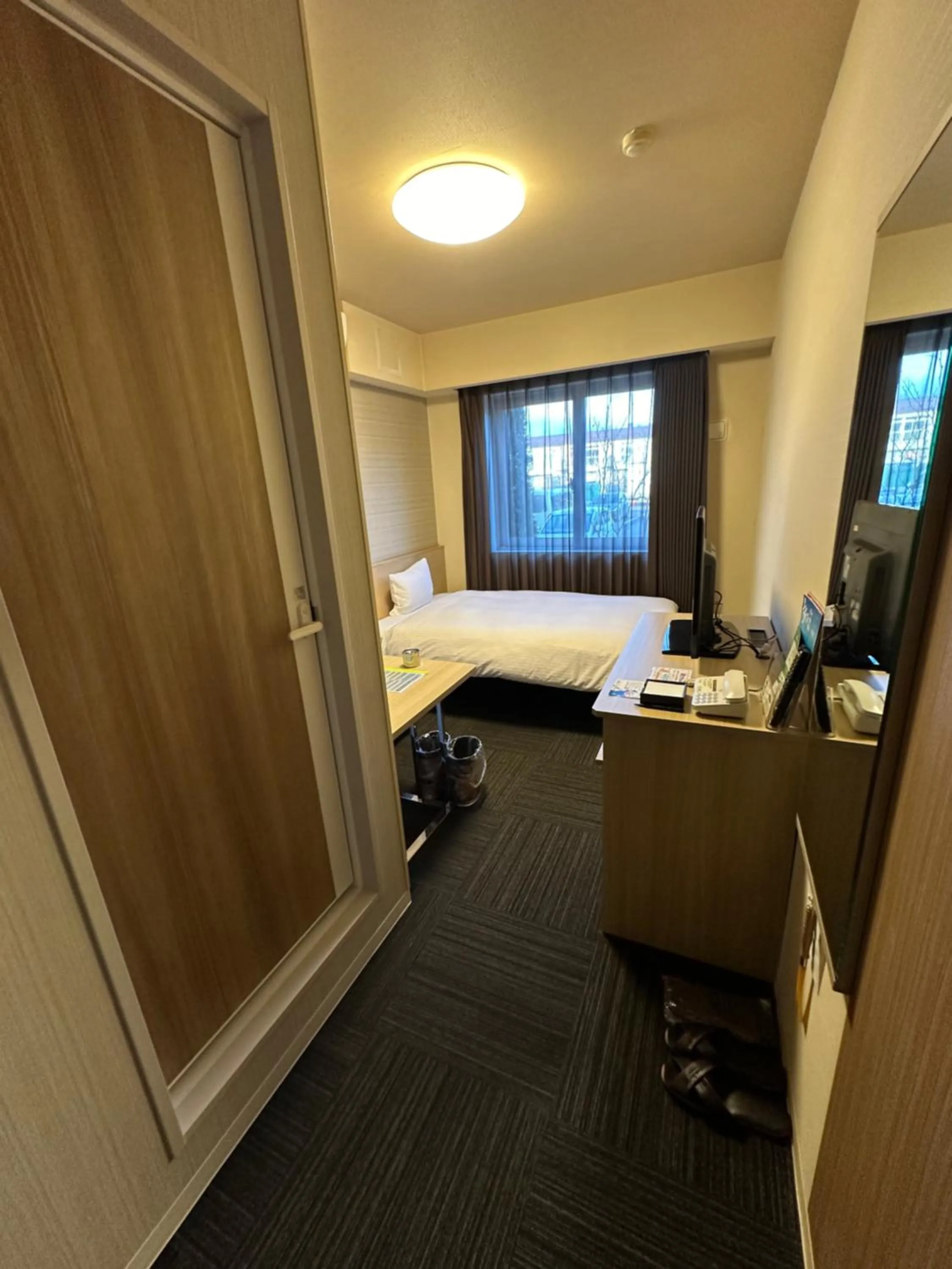 Photo of the whole room, Bed in Hotel Route-Inn Tome