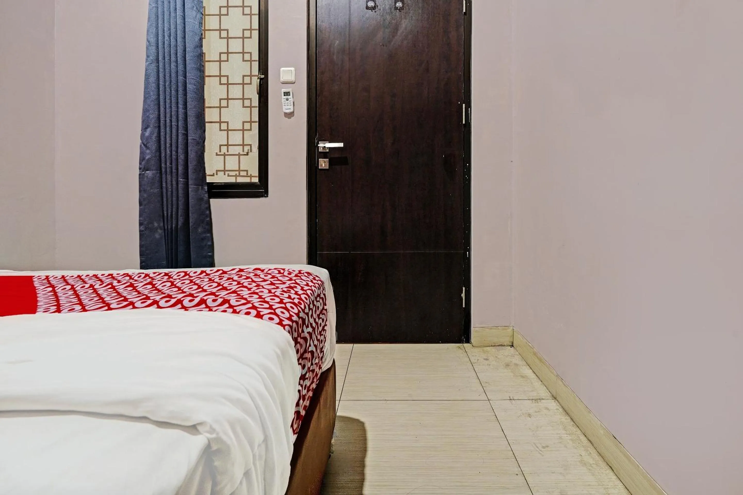 Bedroom in Hotel O JKK Sweet Room