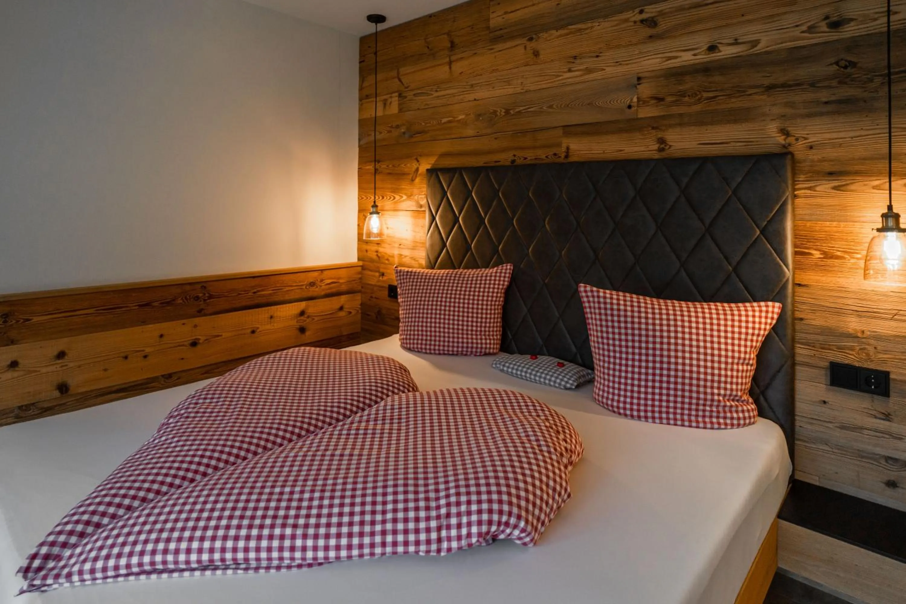 Bed in Hotel Landhaus Tirolerherz