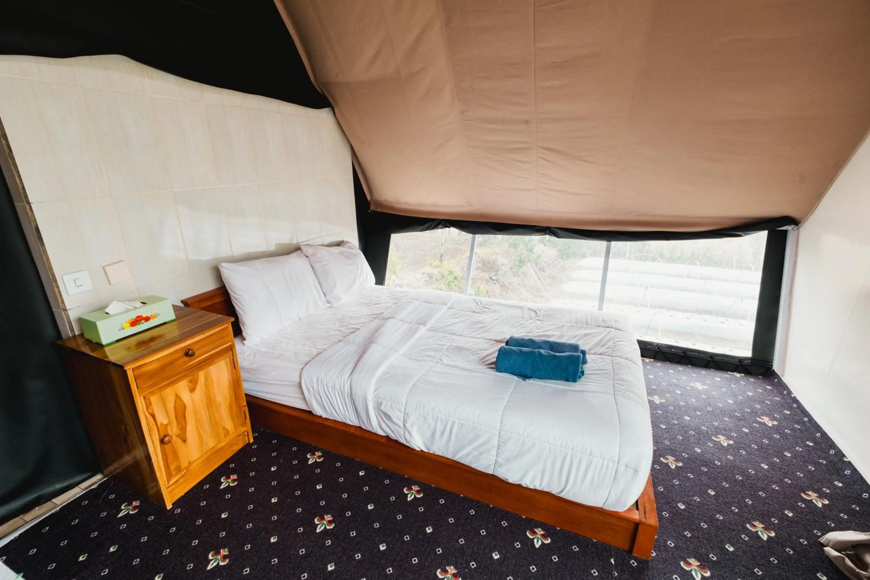 Bed in Popitan Garden Campground & Glamping Bedugul