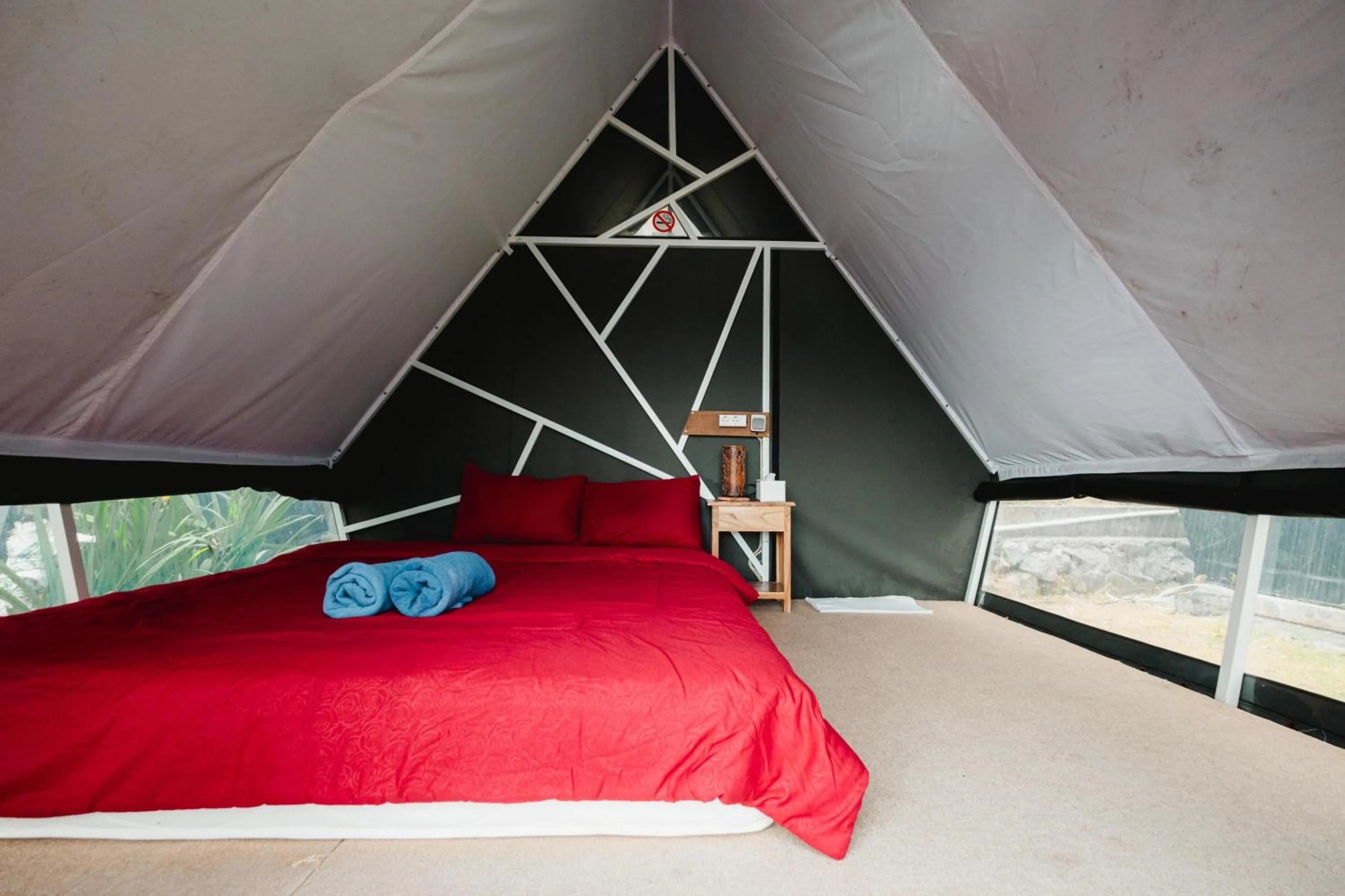 Bed in Popitan Garden Campground & Glamping Bedugul