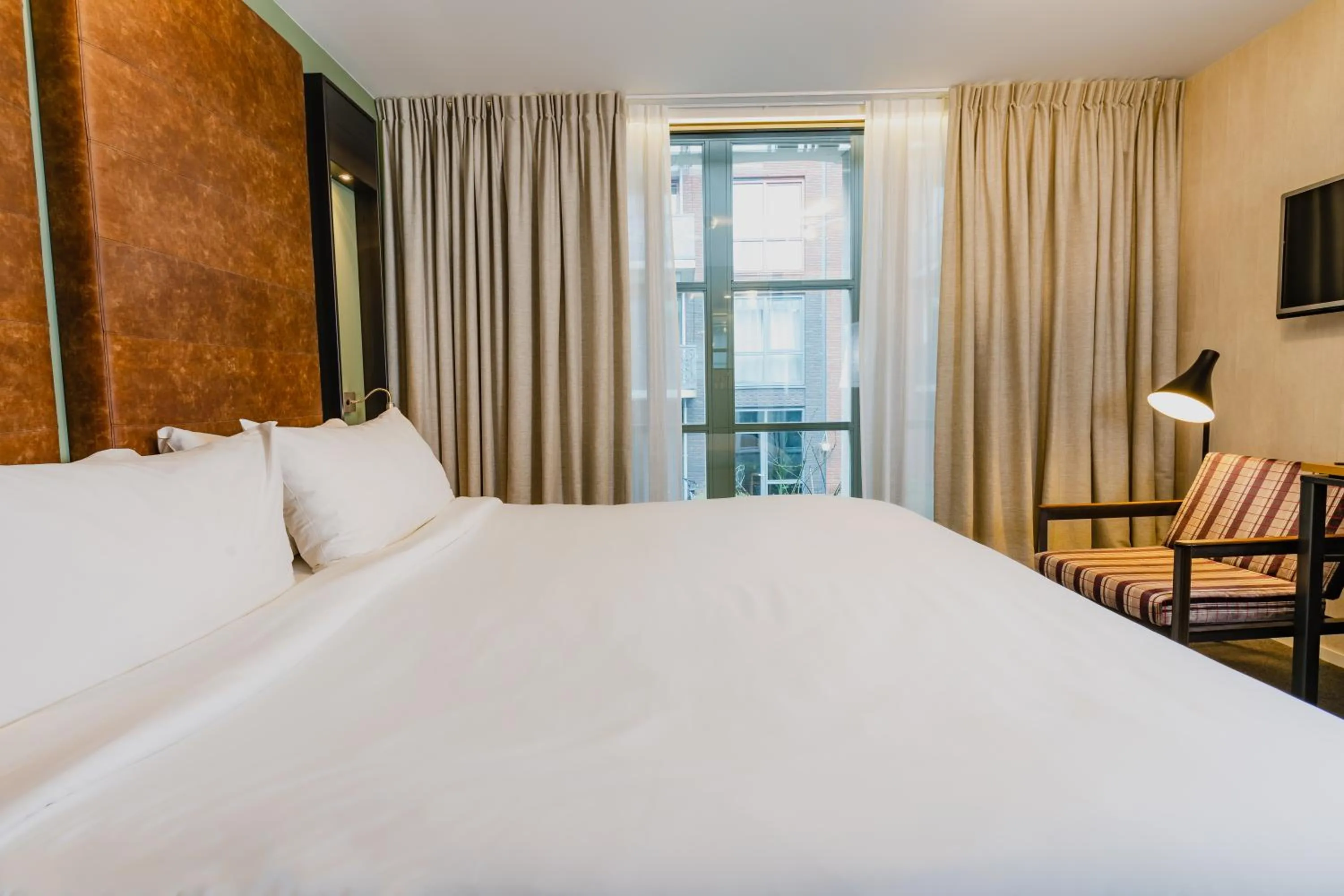 Bed in Hotel De Hallen