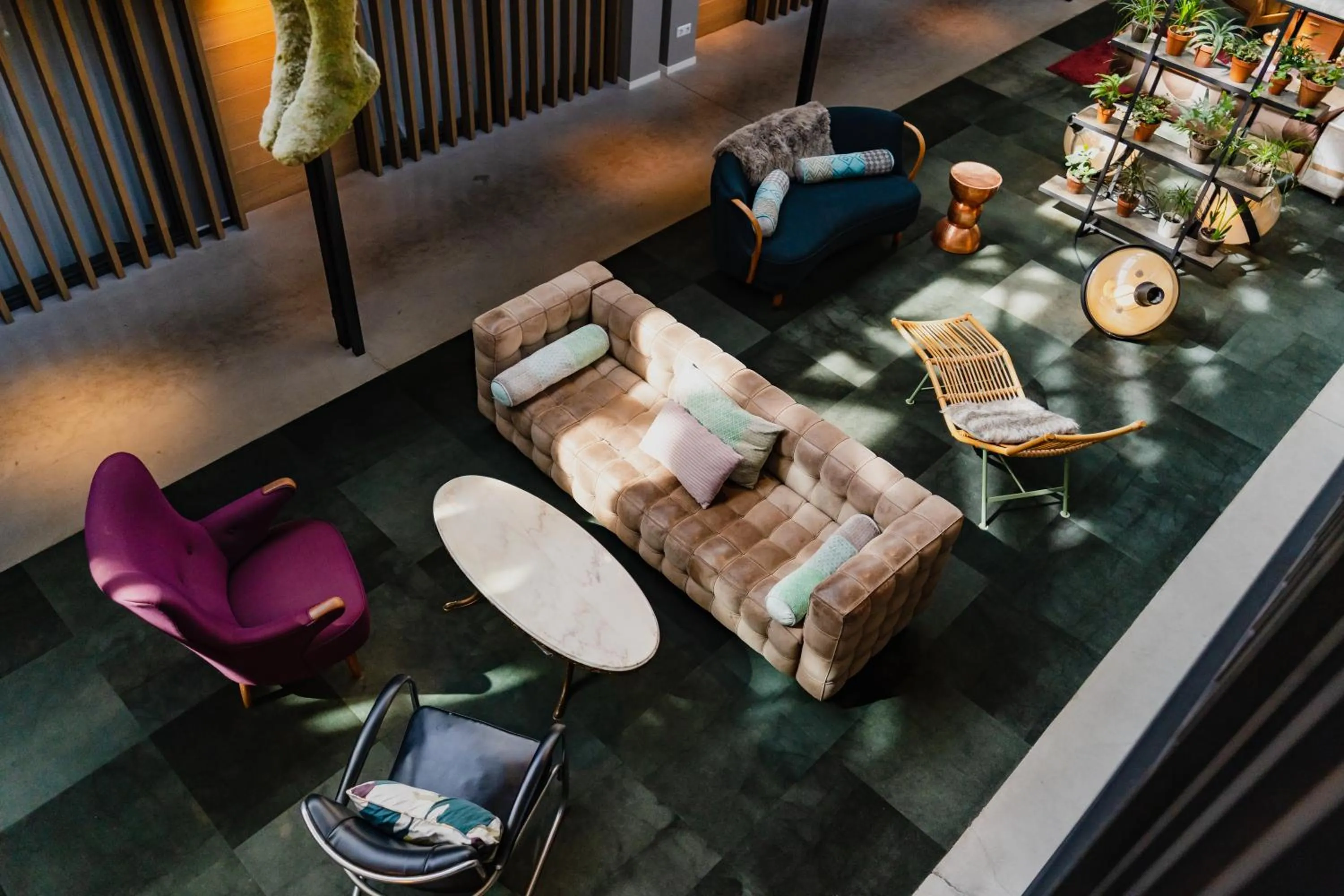 Communal lounge/ TV room in Hotel De Hallen