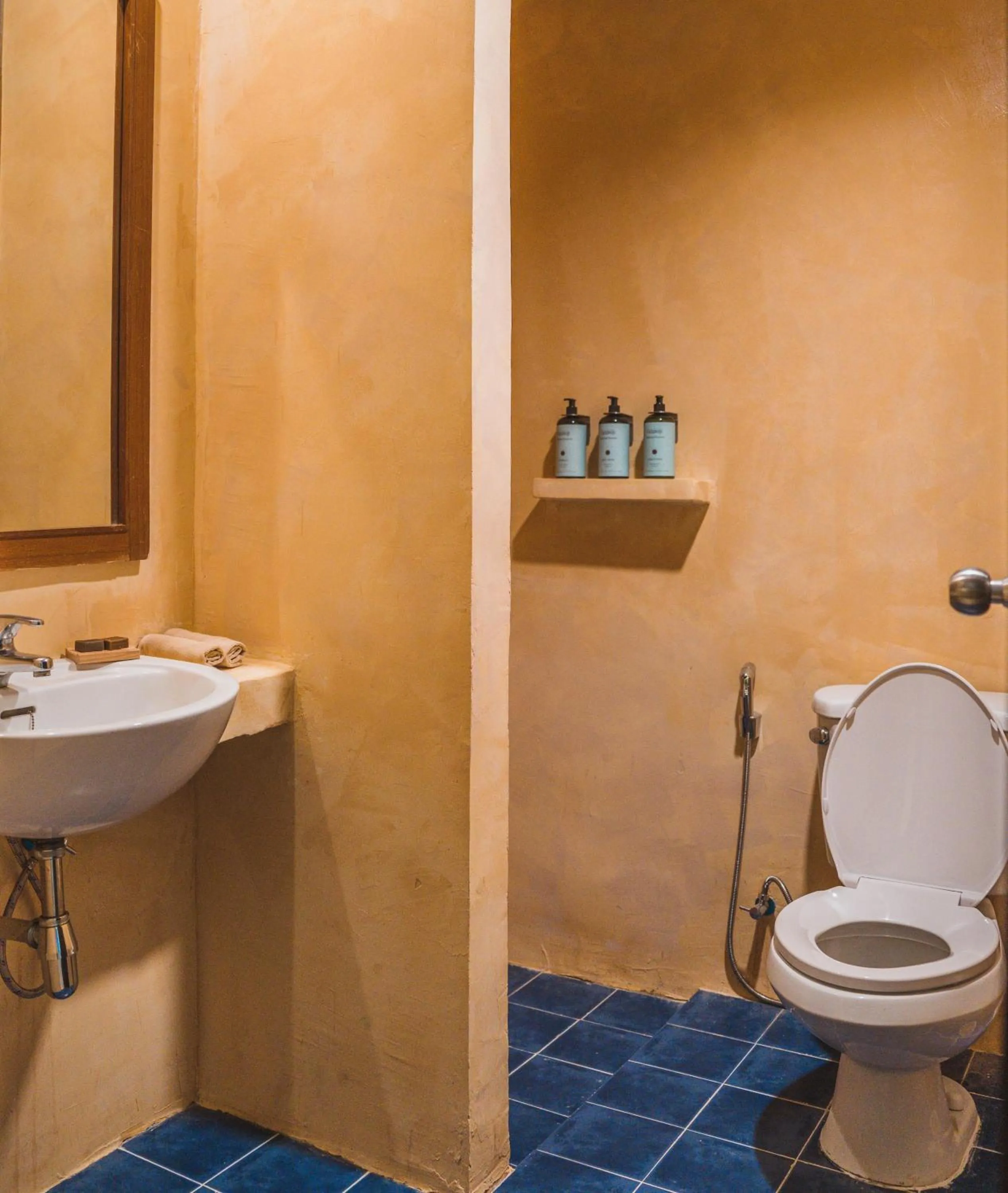 Bathroom in Rustic and Blue Getaway