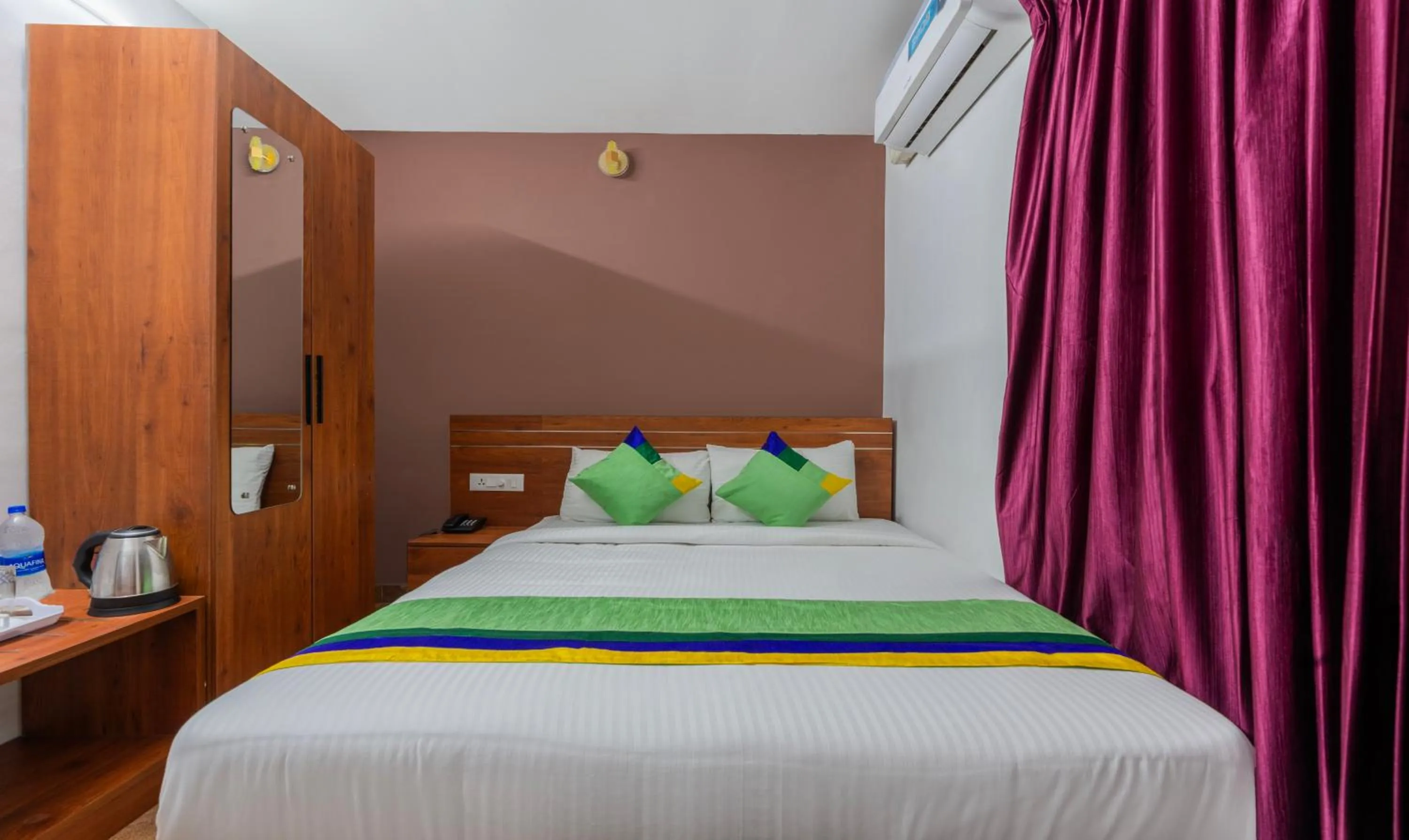 Bed in Treebo JP Residency