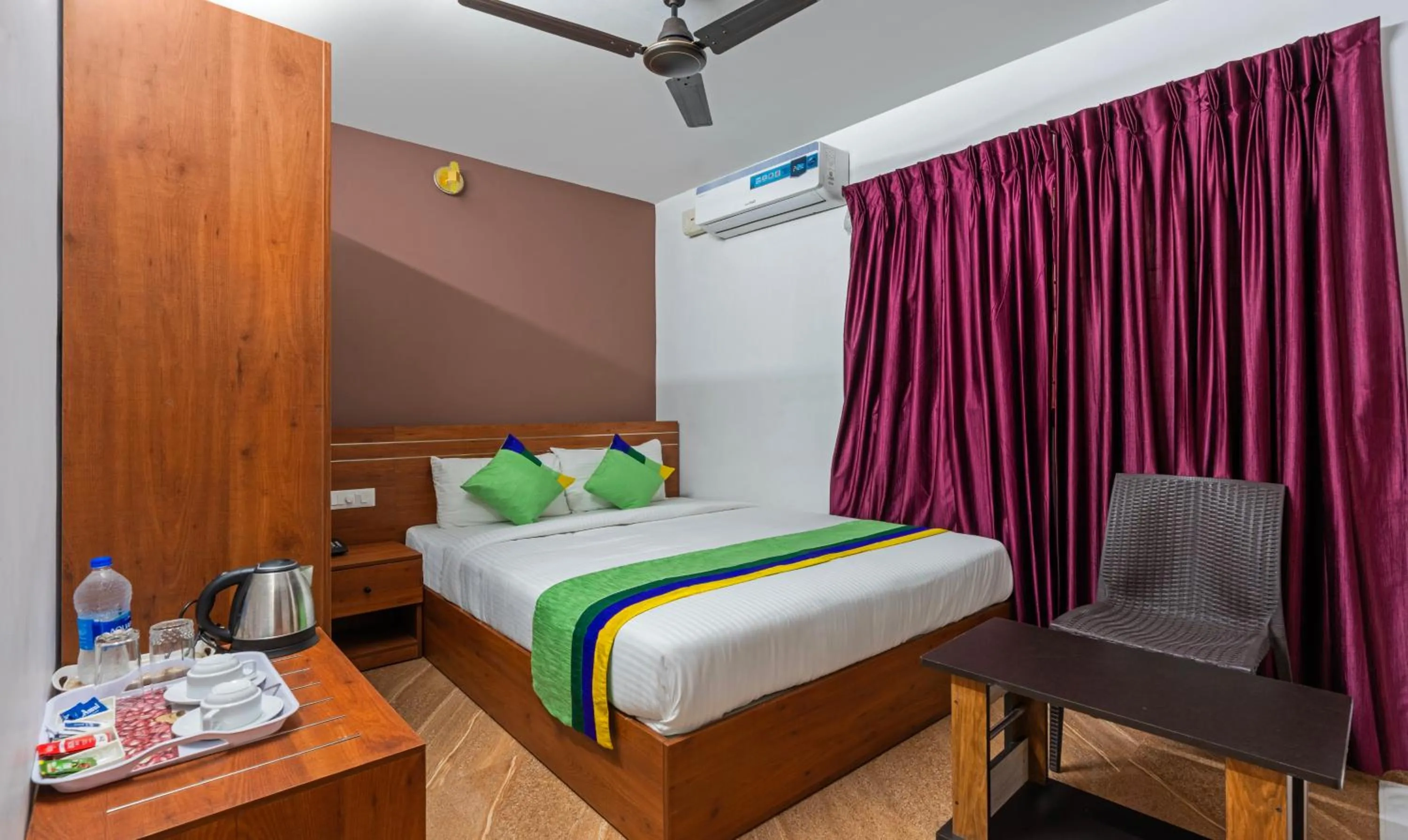 Bed in Treebo JP Residency